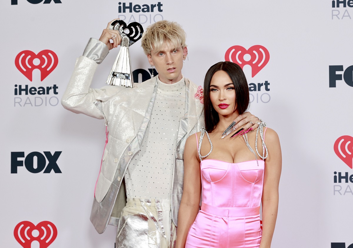 (L-R) Machine Gun Kelly and Megan Fox attend the 2021 iHeartRadio Music Awards in Los Angeles, California.