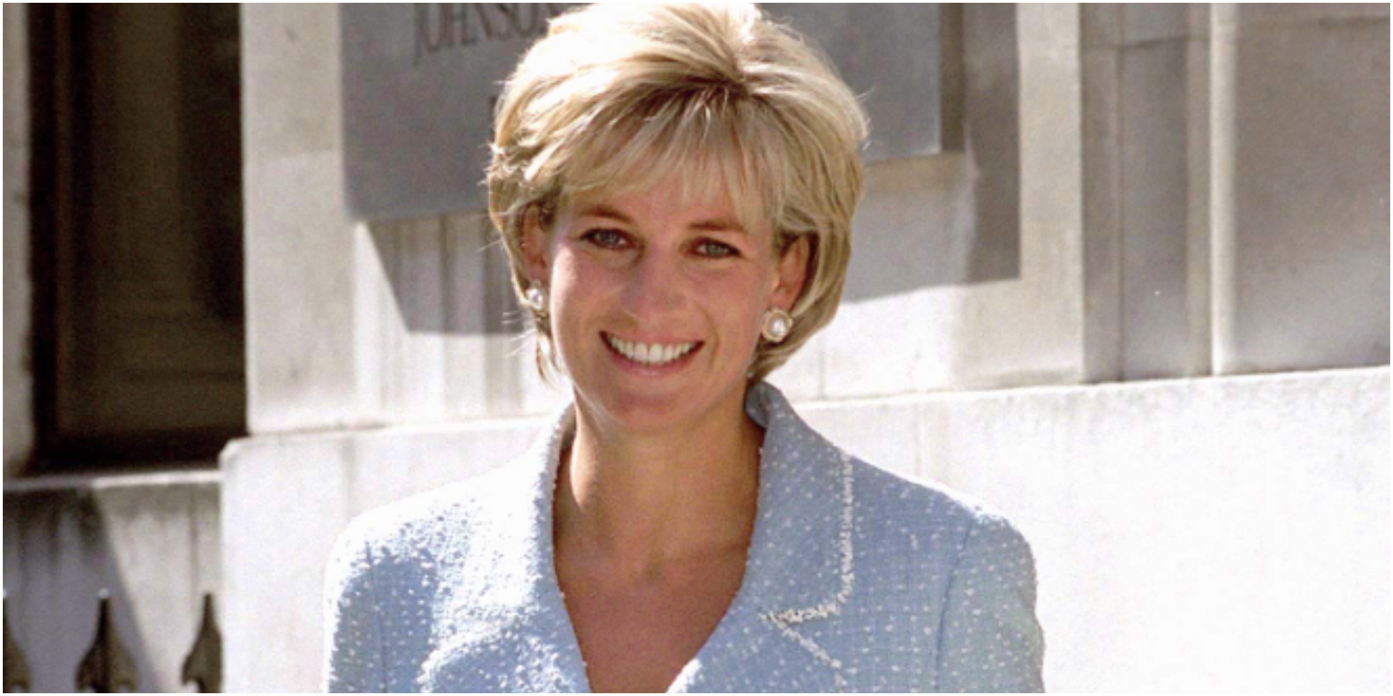 Princess Diana feminist role model in blue suit.