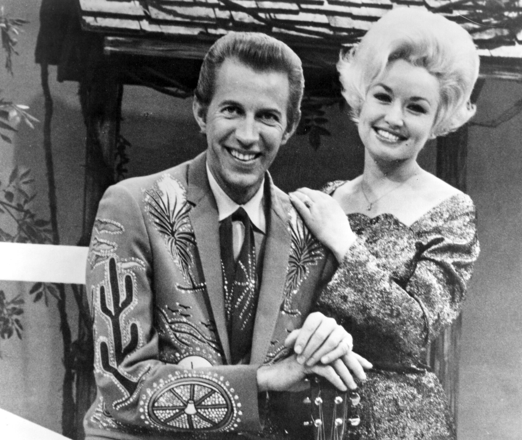 Dolly Parton with her collaborator Porter Wagoner on the set of his TV show in 1967.