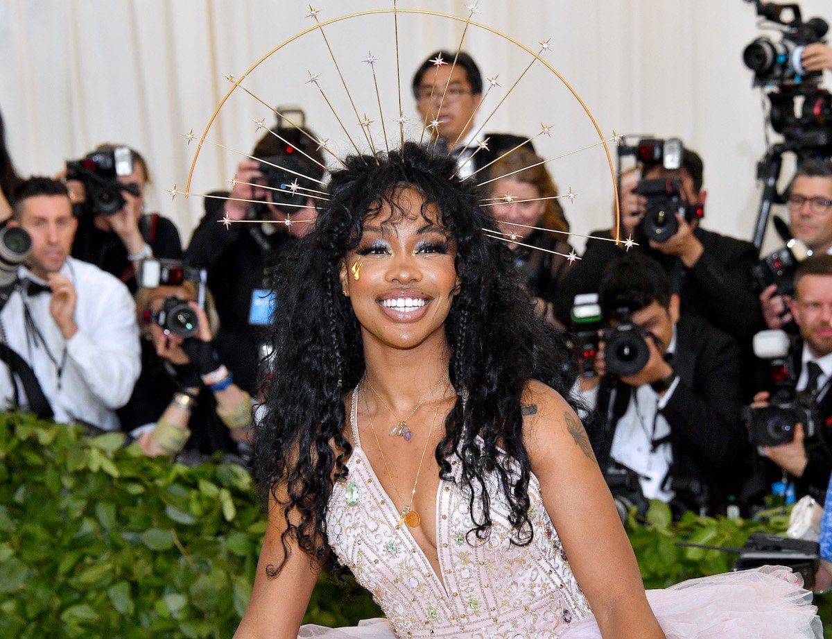 SZA wears an off white dress and crown as she attends the Catholic Imagination Costume Institute Gala at The Metropolitan Museum of Art on May 7, 2018 in New York City.