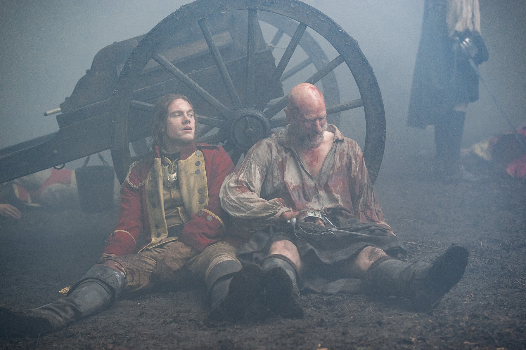 Tom Brittney and Graham McTavish in battle scene from 'Outlander' Season 2 episode 'Prestonpans'