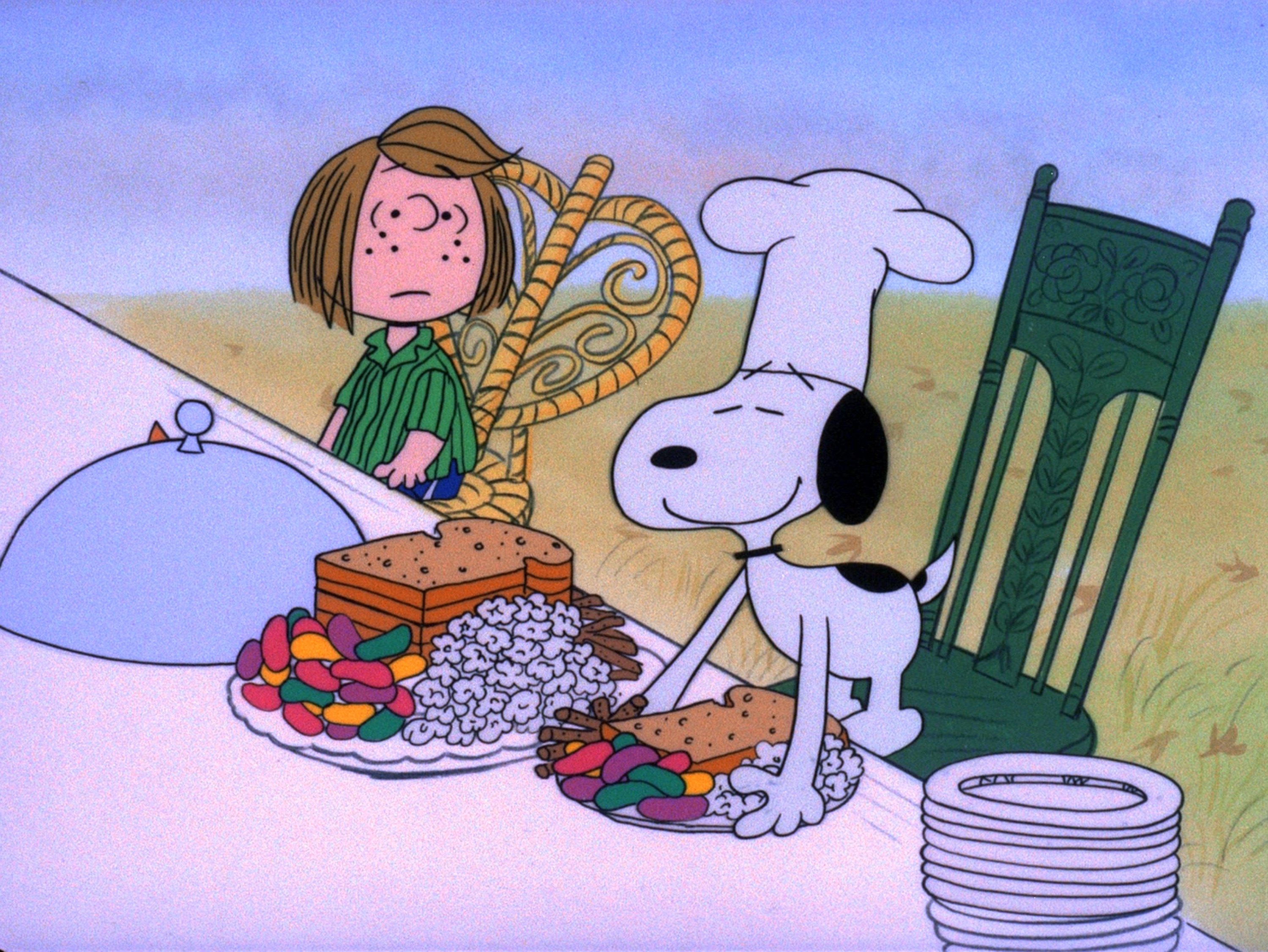 Peppermint Patty looks at Snoopy serving meal in 'A Charlie Brown Thanksgiving'