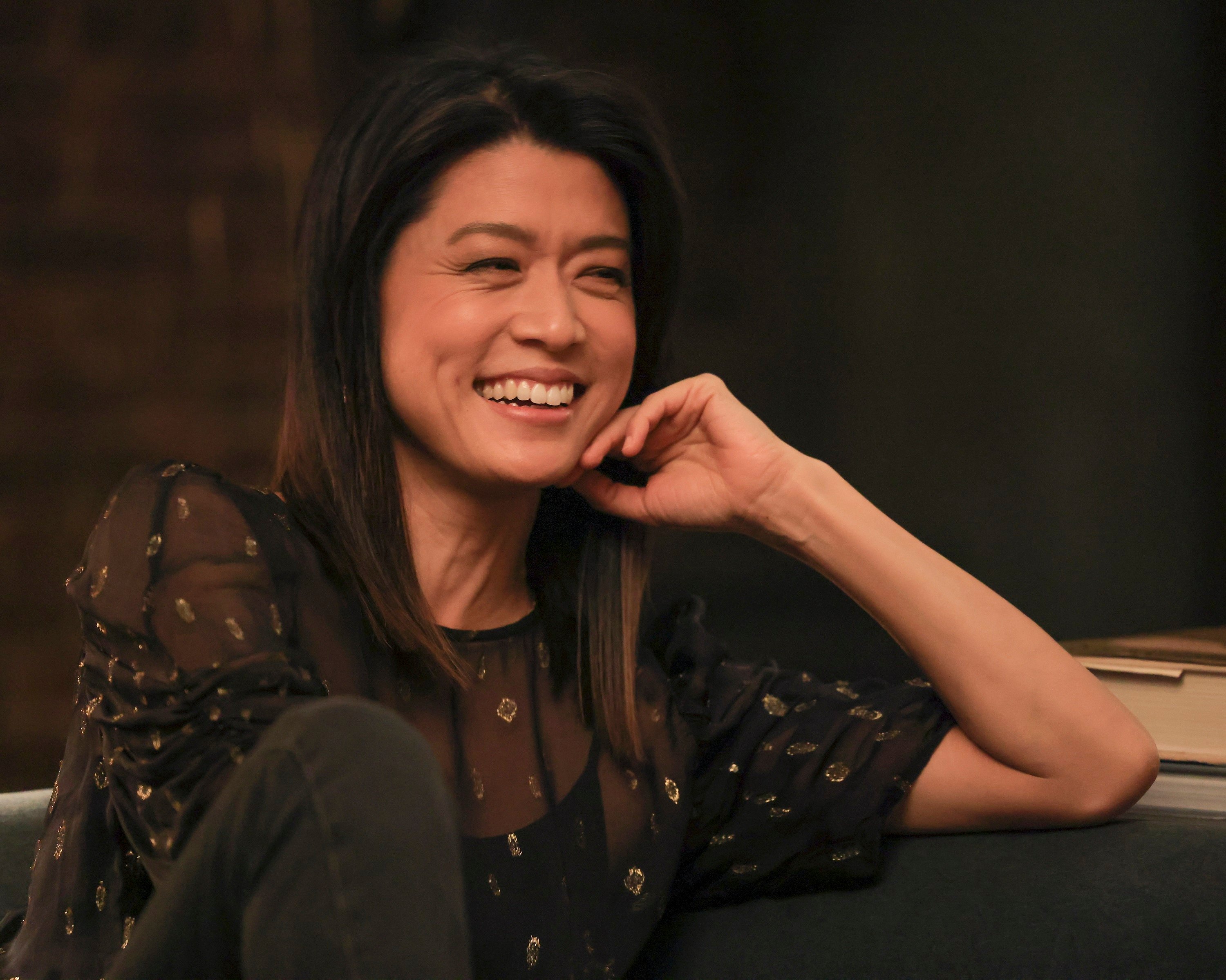 A Million Little Things cast member Grace Park smiles as Katherine Kim in season 4