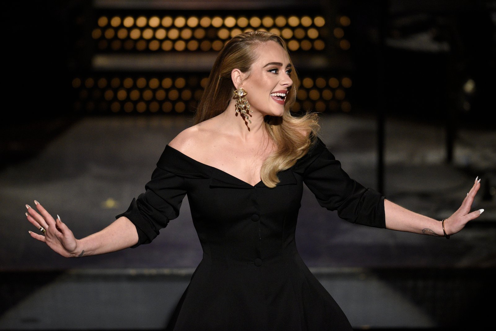 Adele wears a black outfit while hosting 'Saturday Night Live' during the opening monologue