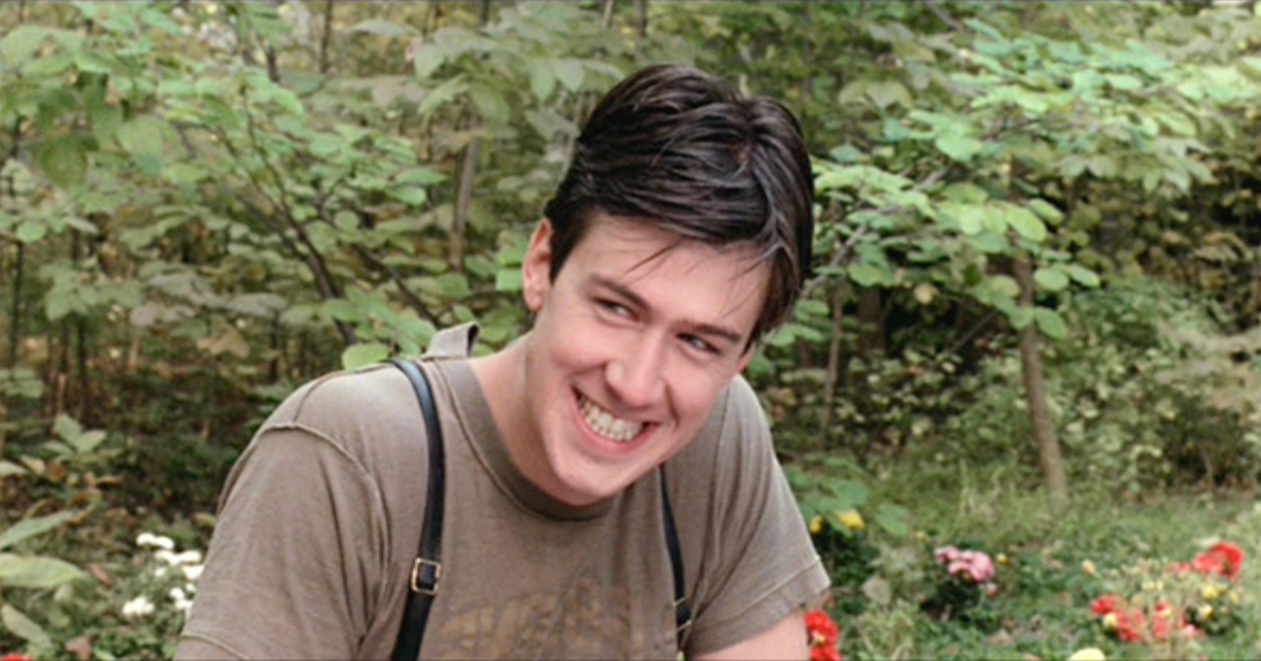 Ferris Bueller star Alan Ruck wearing a brown shirt in the film.