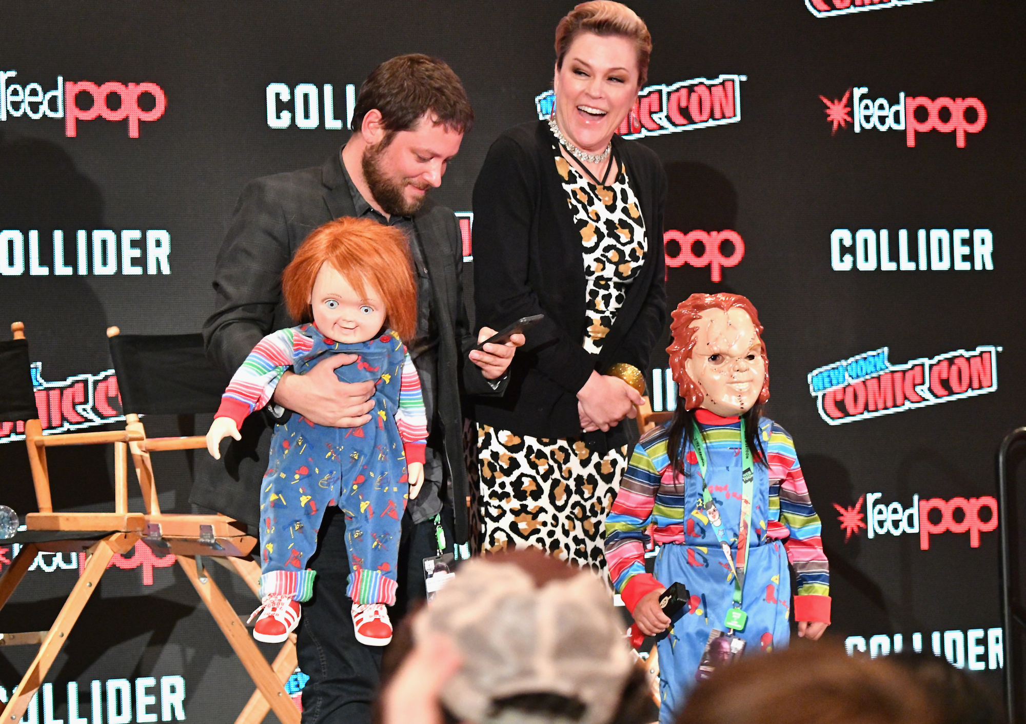 Alex Vincent and Christine Elise pose with a Chucky cosplayer