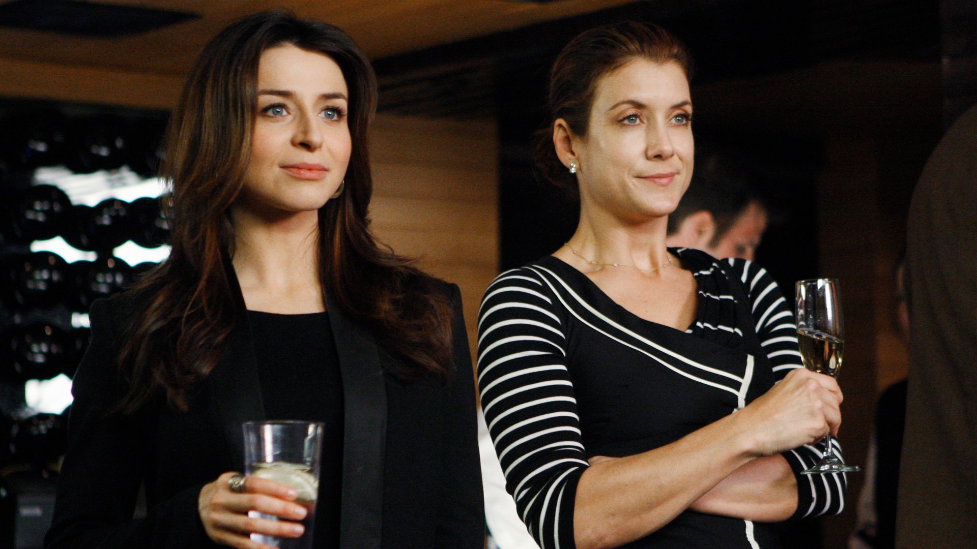 Caterina Scorsone as Amelia Shepherd and Kate Walsh as Addison Montgomery stand together in the ‘Grey’s Anatomy’ spinoff ‘Private Practice’