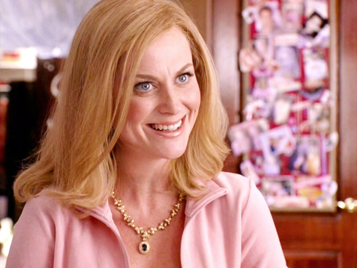 Amy Poehler in a pink track suit