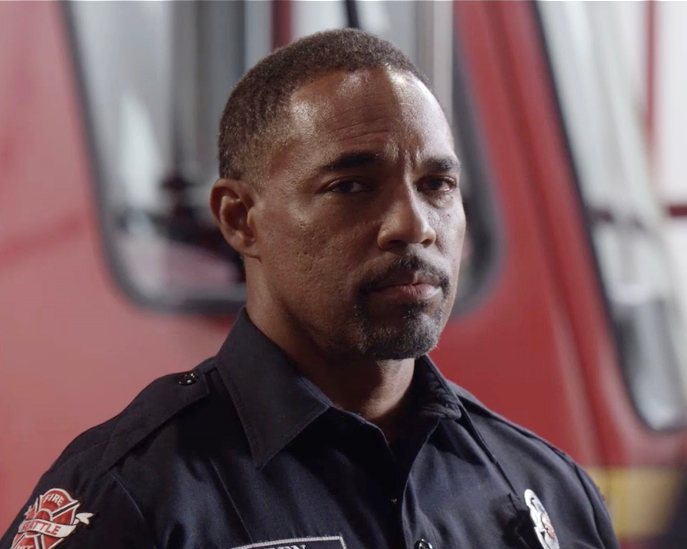 Jason George looking at the camera as Ben Warren from 'Station 19'