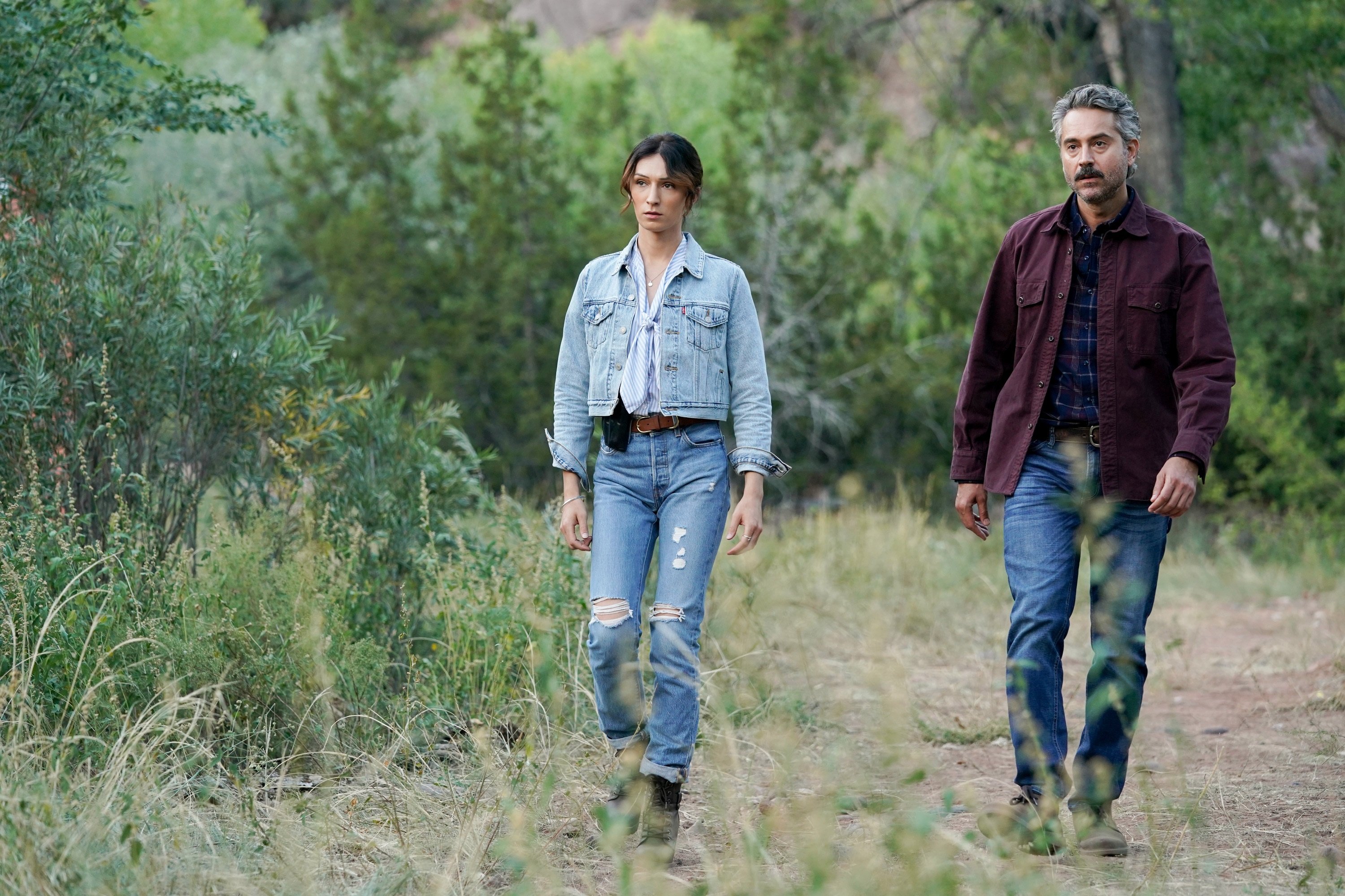 Jesse James Keitel and Omar Metwally walking in 'Big Sky' Season 2 Episode 4