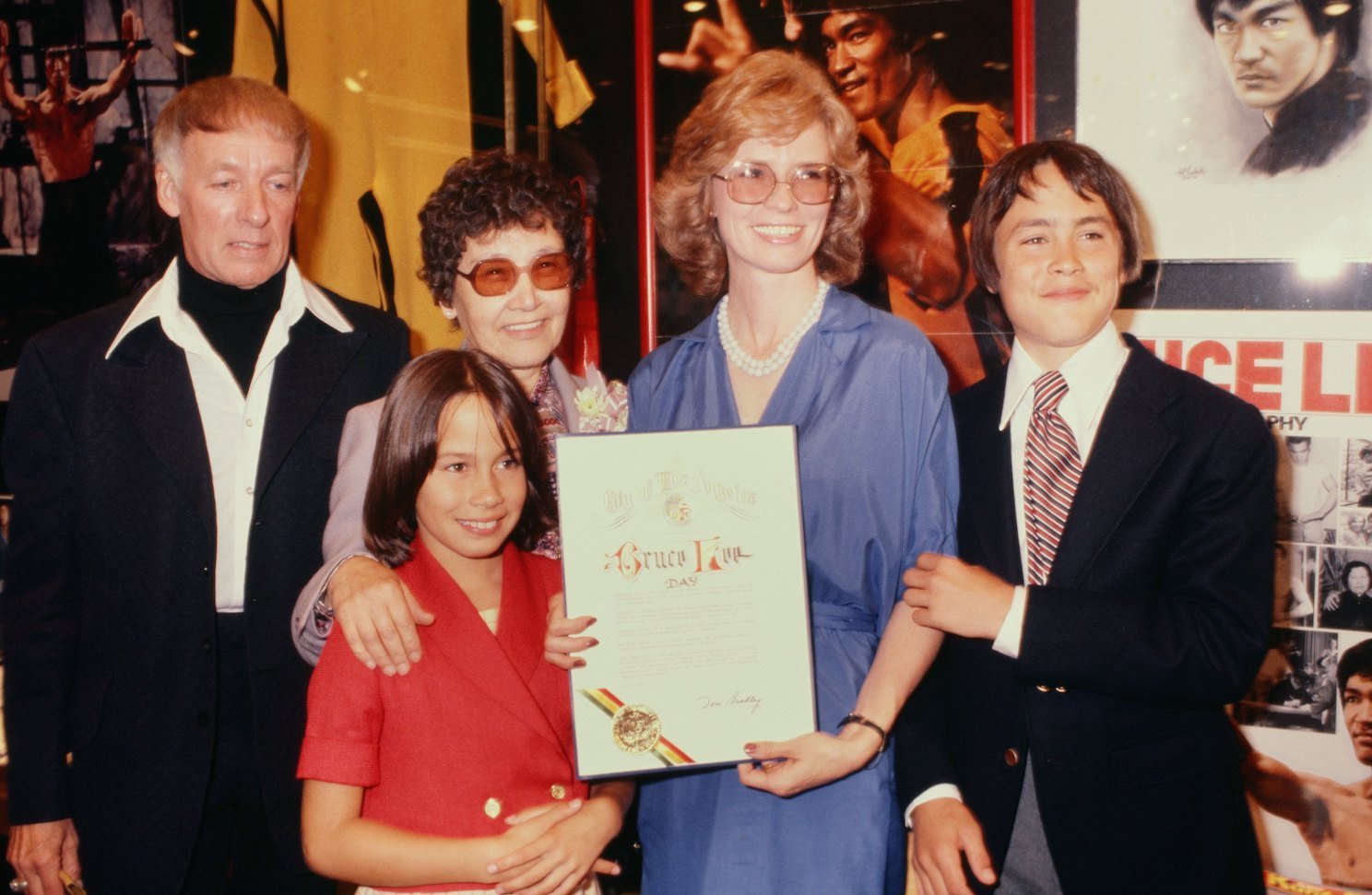 Bruce Lee's mother, wife Linda, and children Brandon Lee and Shannon Lee celebrate Bruce Lee Day circa 1979
