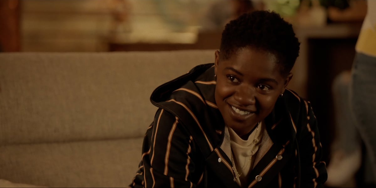 Bre-Z wearing a brown hoodie in 'All American.'