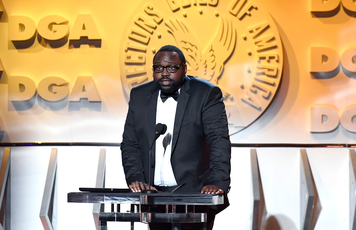 Brian Tyree Henry about to speak in front of a podium