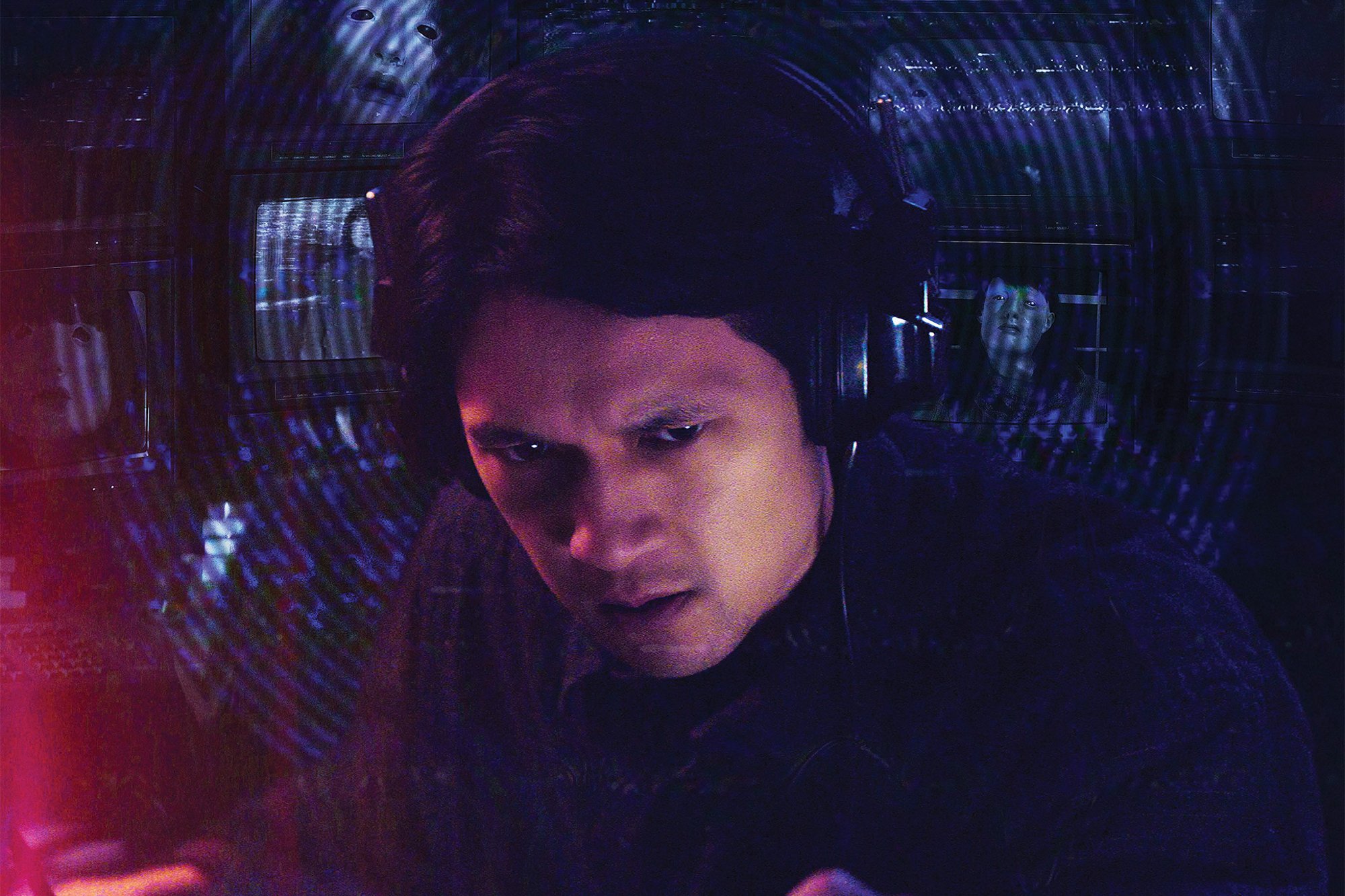 'Broadcast Signal Intrusion' actor Henry Shum Jr. with headphones on the poster