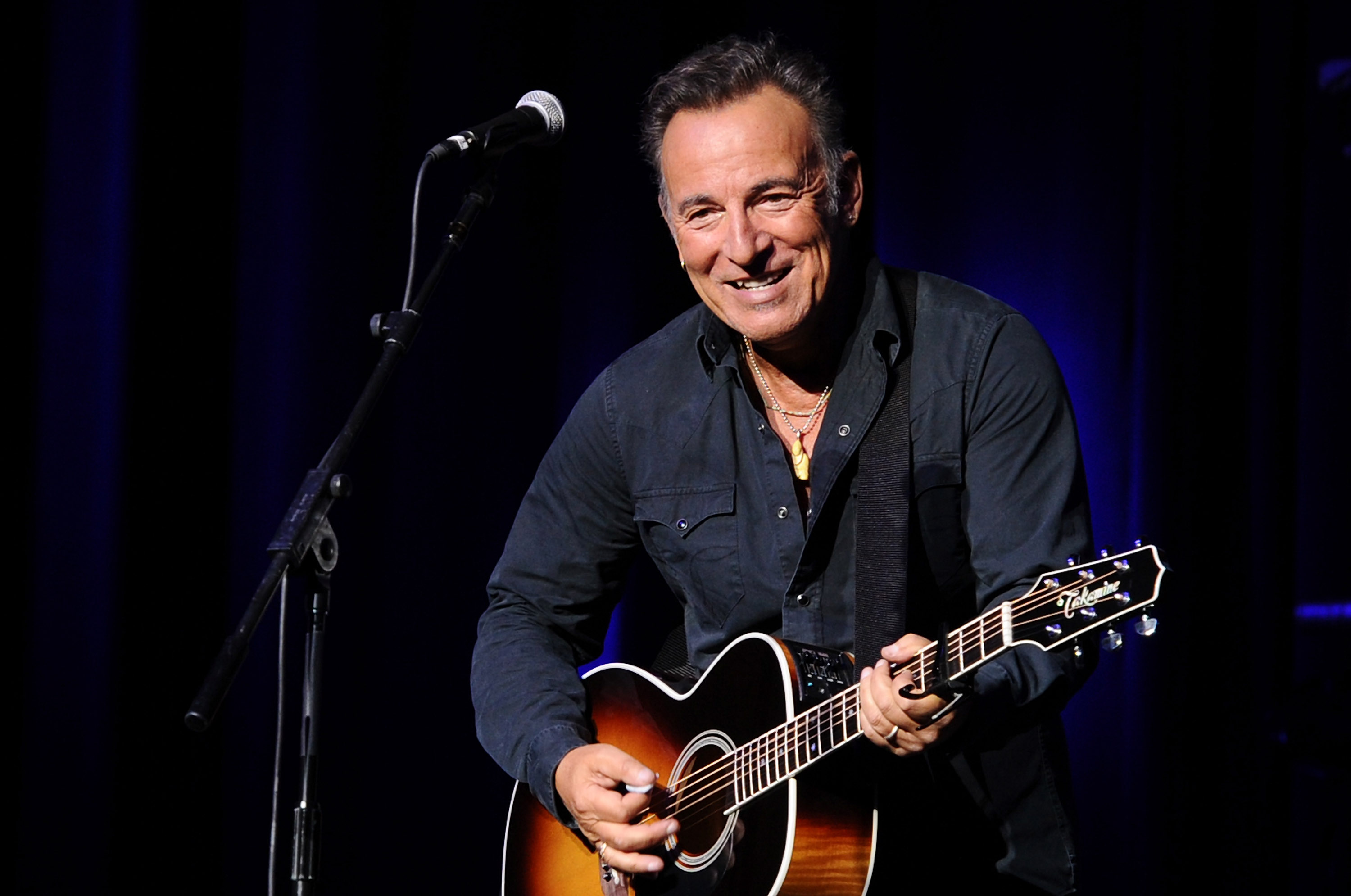 Musician Bruce Springsteen performs on stage at the New York Comedy Festival