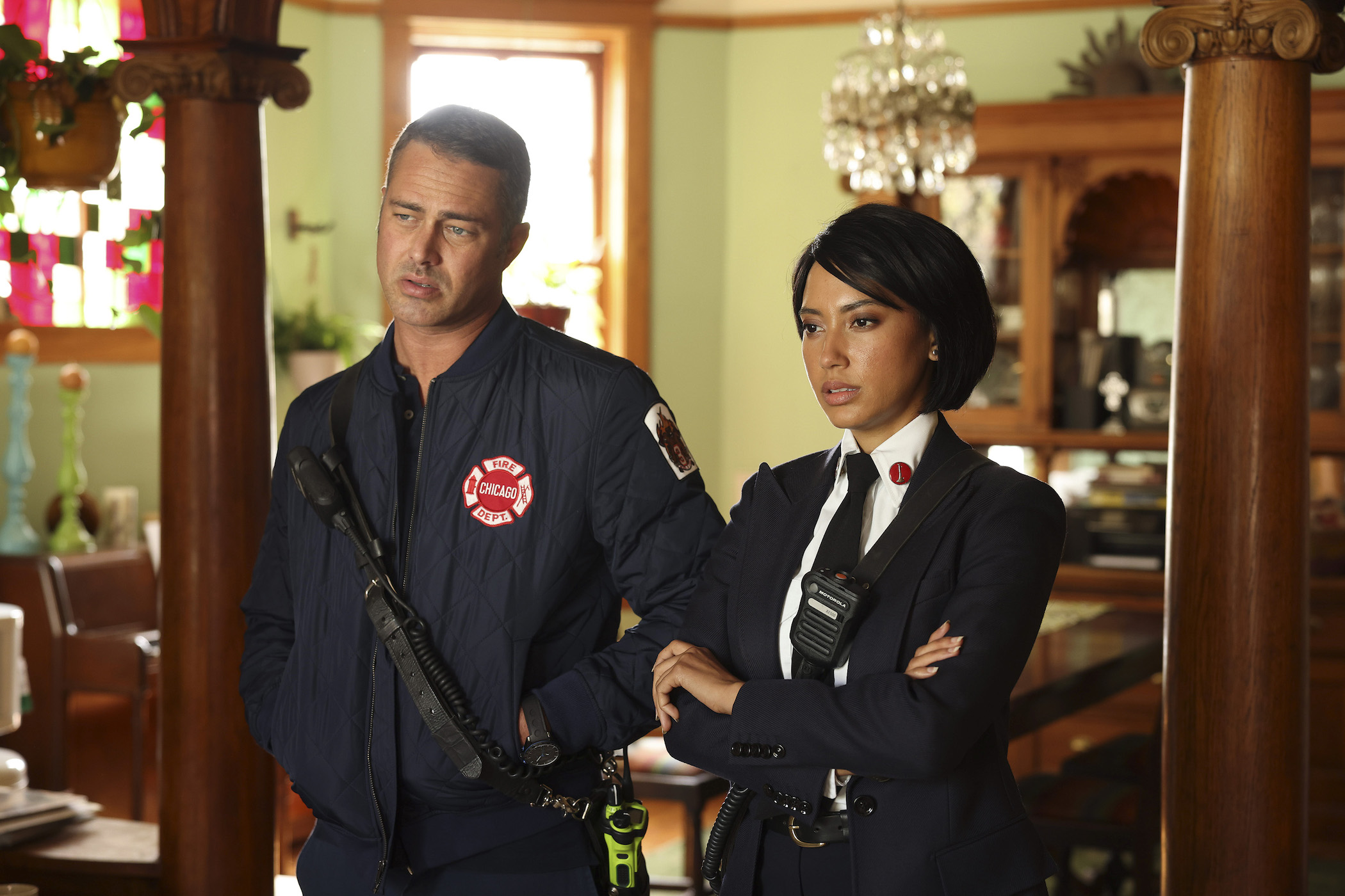 Taylor Kinney as Kelly Severide and Andy Allo as Wendy Seager standing together in 'Chicago Fire' Season 10
