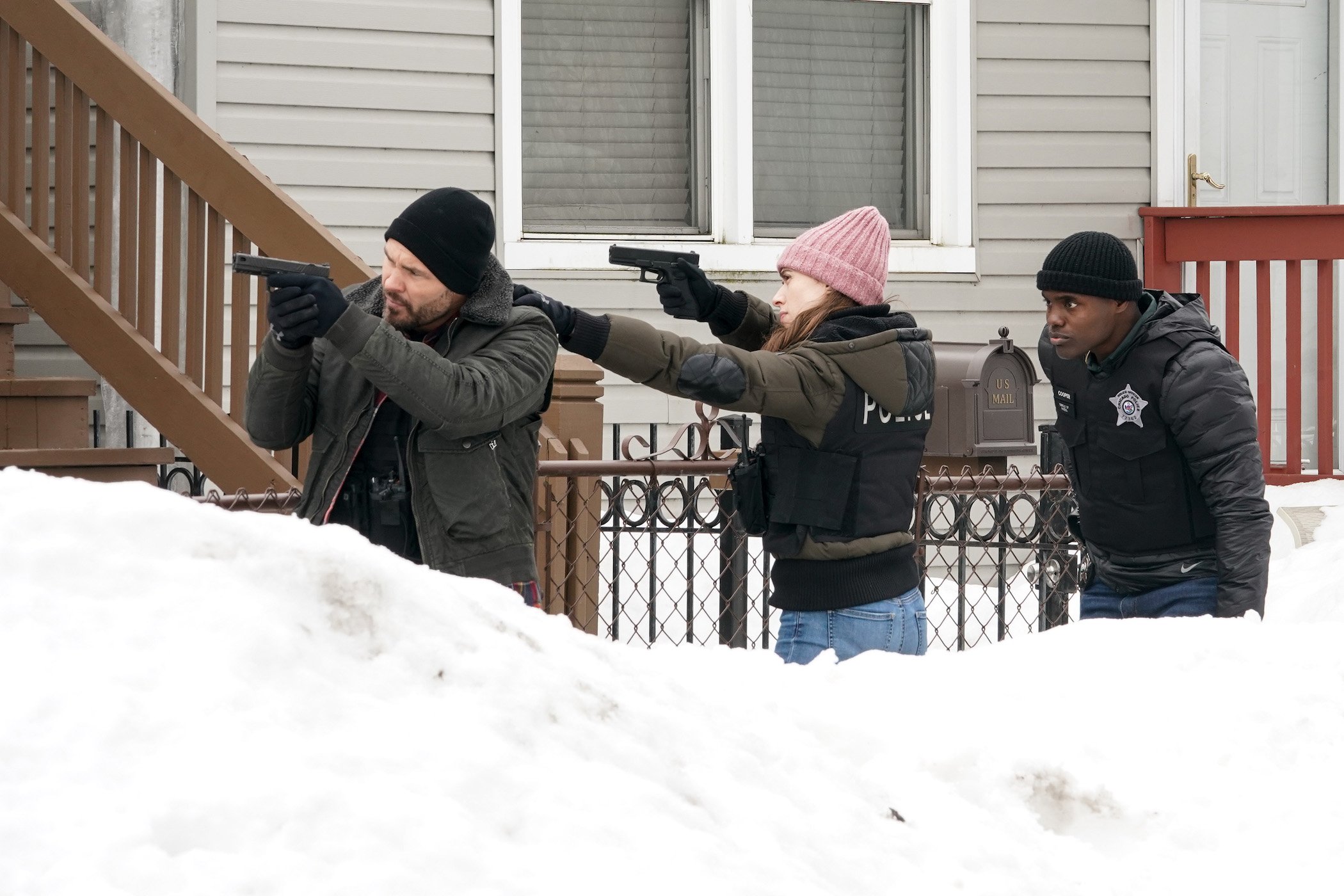 'Chicago P.D.' cast members -- John Flueger as Adam Ruzek, Marina Squerciati as Kim Burgess, and Cleveland Berto as Andre Cooper. Fans want to know if Cleveland Berto will return to 'Chicago P.D.' Season 9