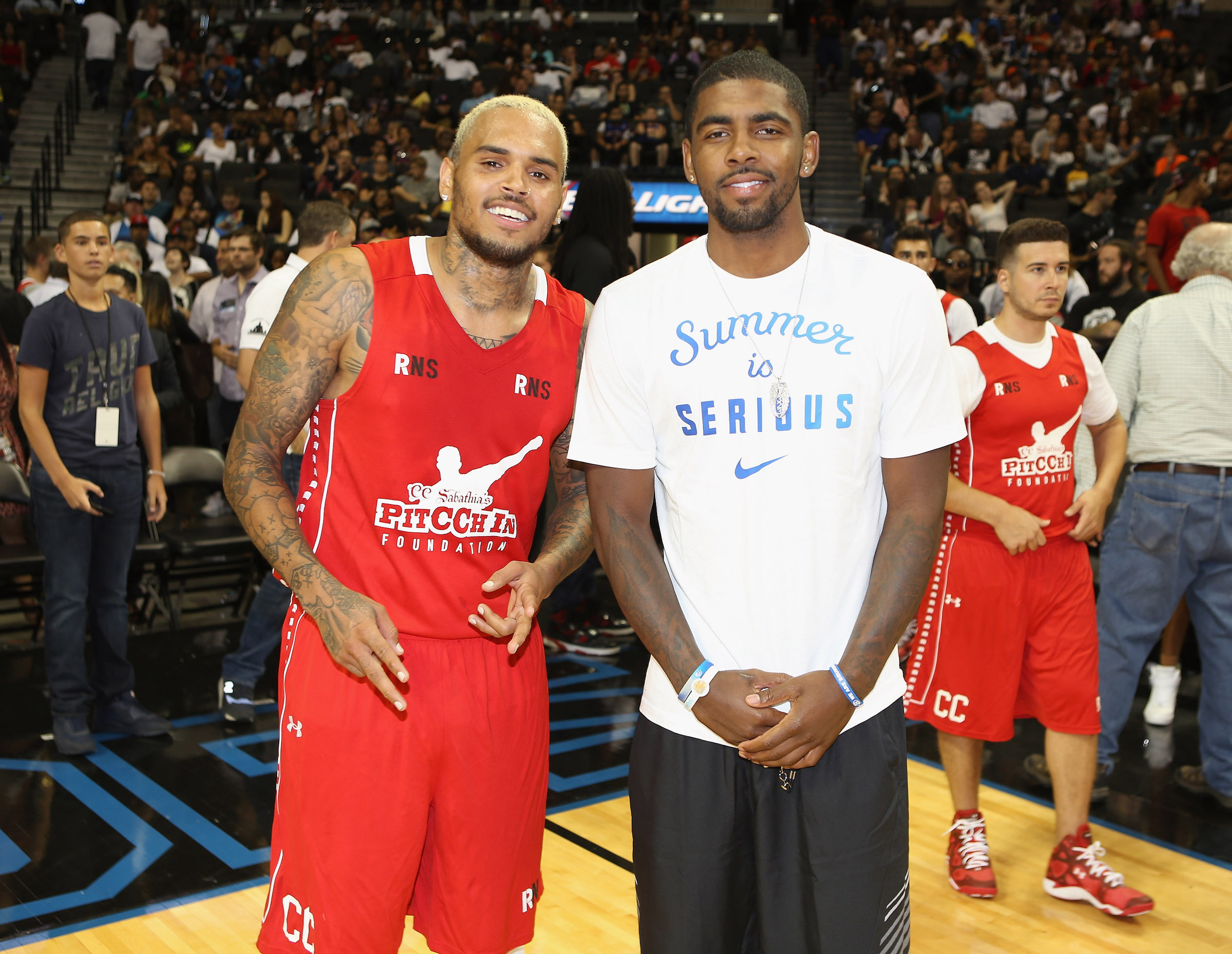 Chris Brown and Kyrie Irving smiling