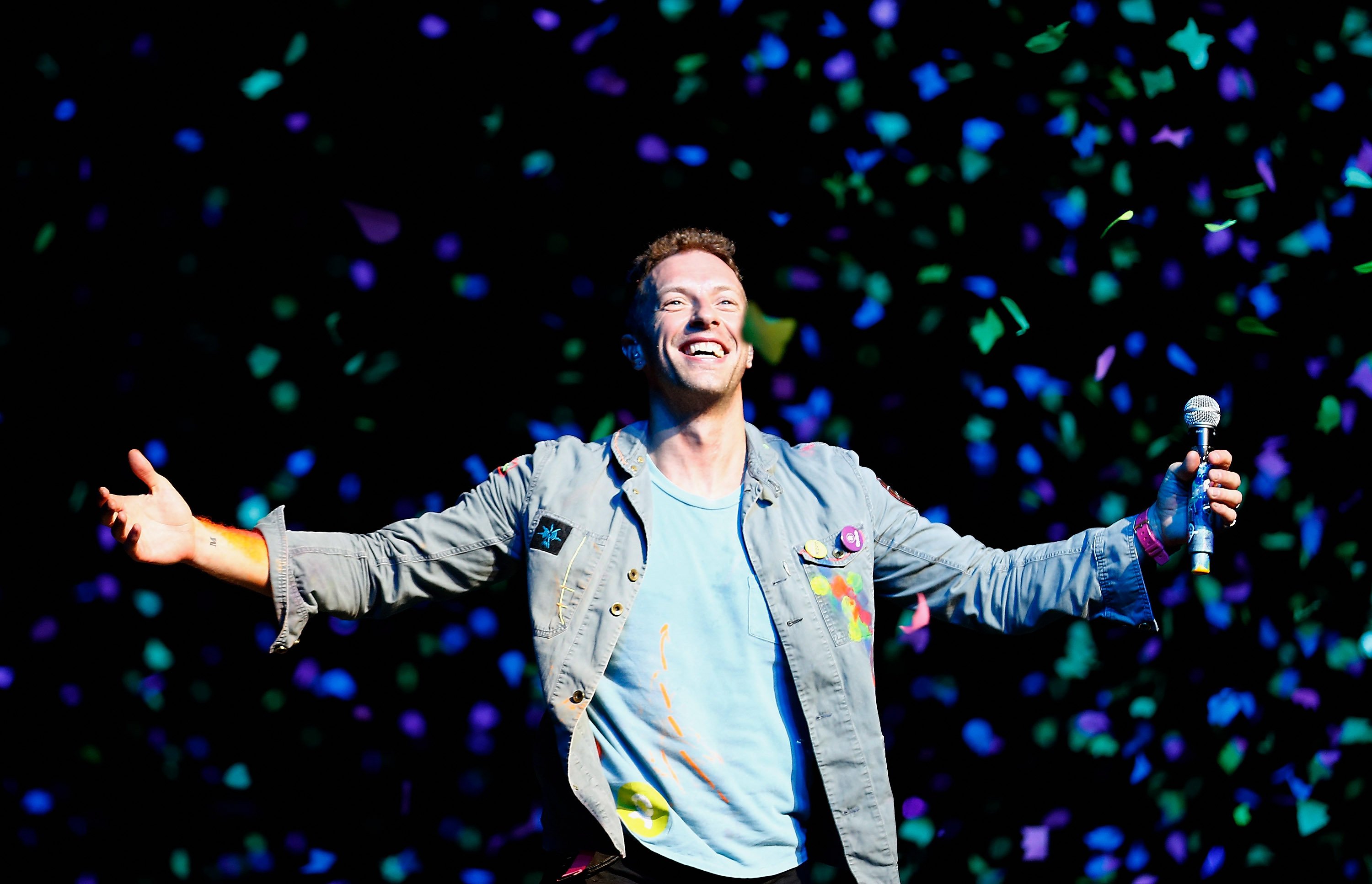 Chris Martin of Coldplay performs for fans in Auckland, New Zealand