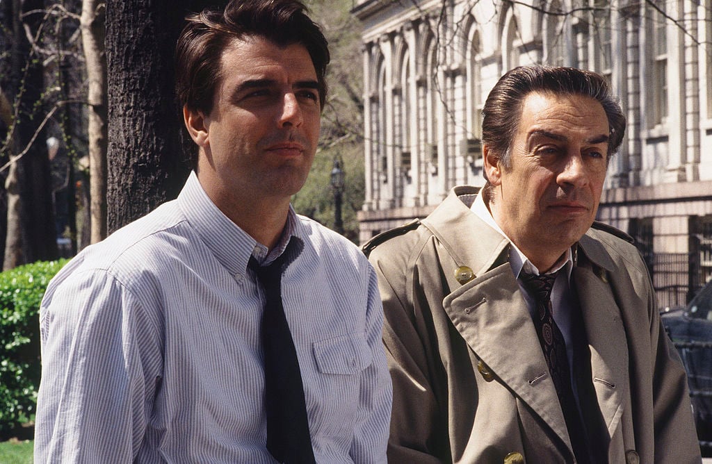 Chris Noth as Detective Mike Logan, Jerry Orbach as Detective Lennie Briscoe stand side-by-side in scene from 'Law & Order'.