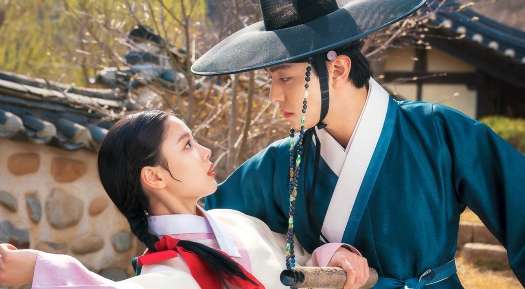 Chun-gi and Ha Ram from 'Lovers of the Red Sky' K-drama scenes embracing each other before falling