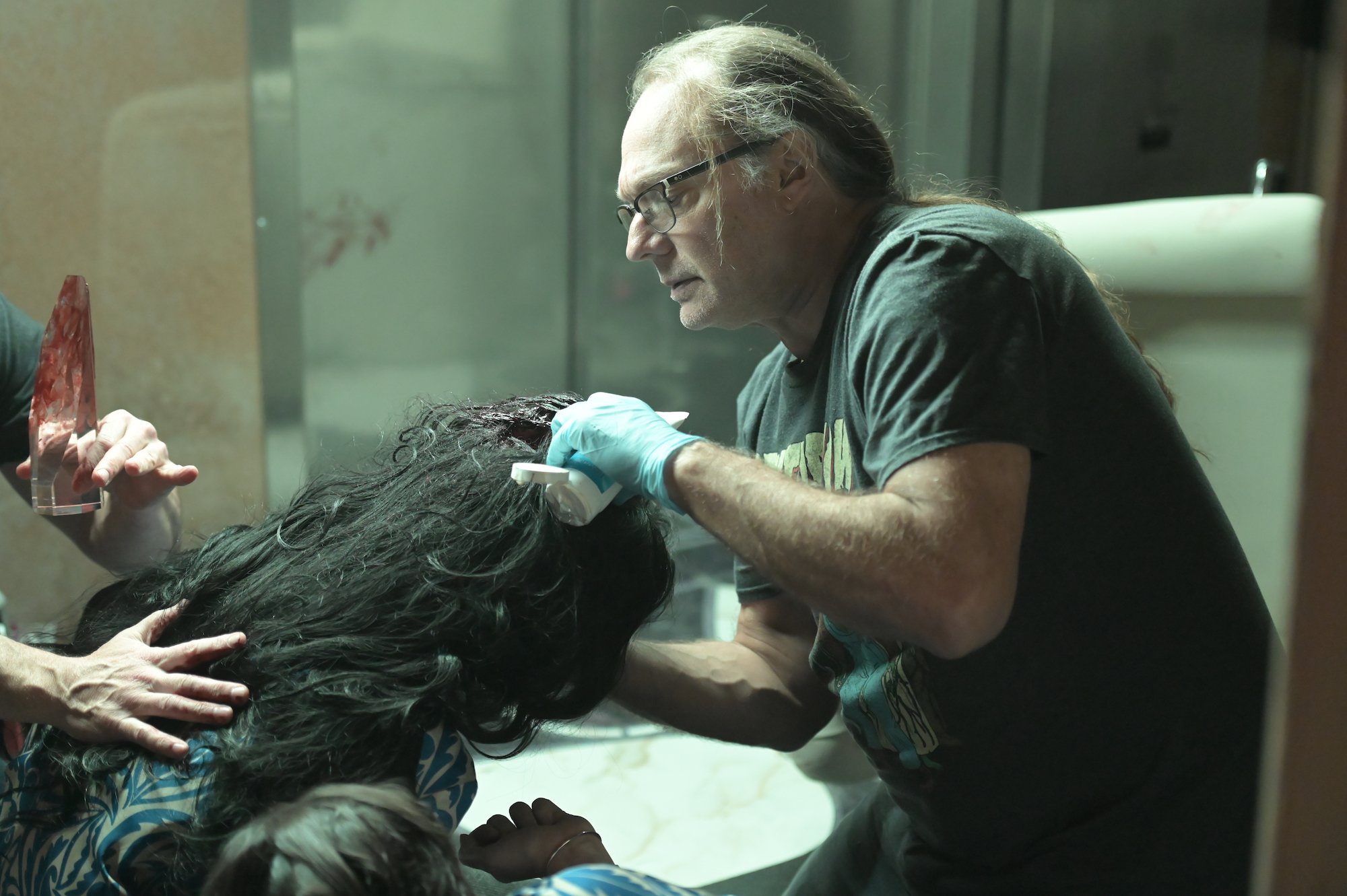 'Creepshow' director and EP Greg Nicotero touches up a head wound