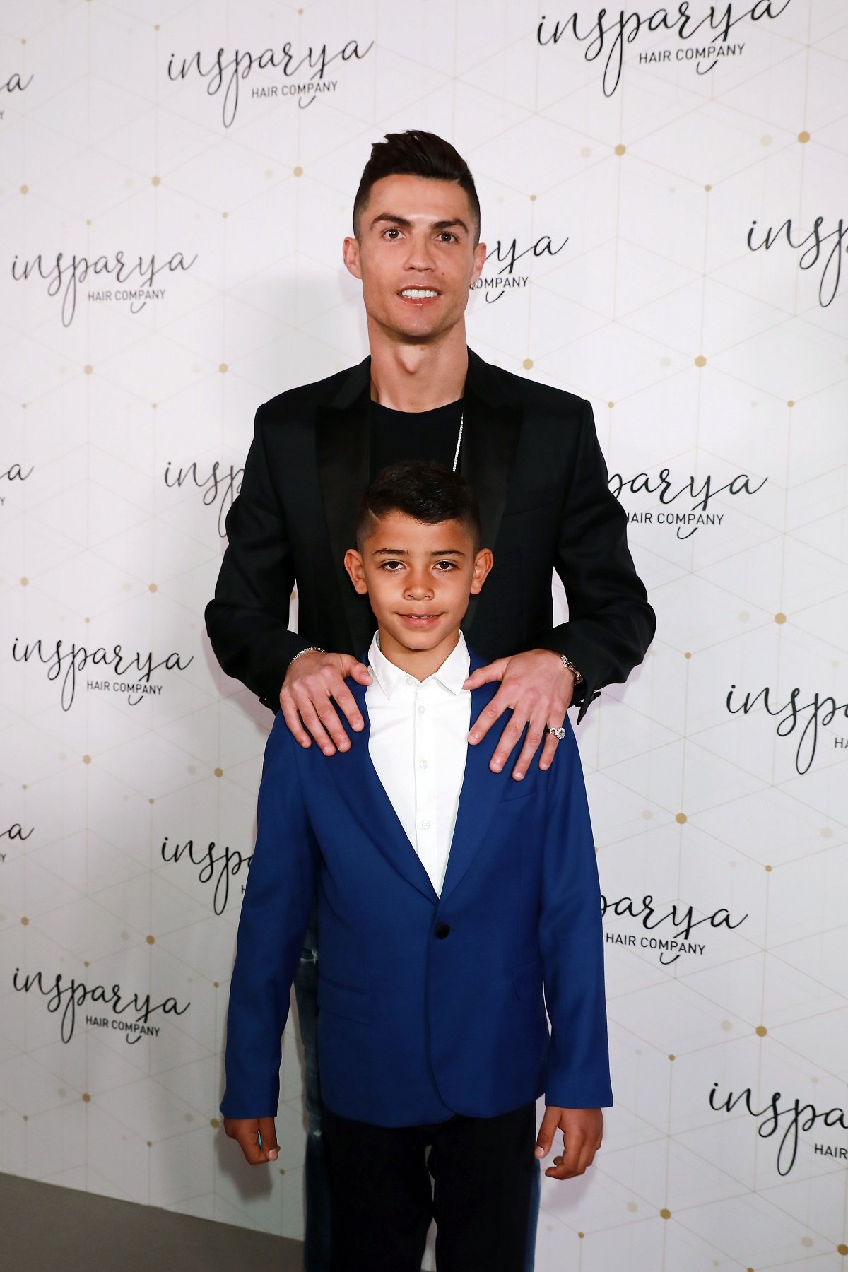 Cristiano Ronaldo and his son, Cristiano Ronaldo Jr., pose for photo at 'Isparya' inauguration
