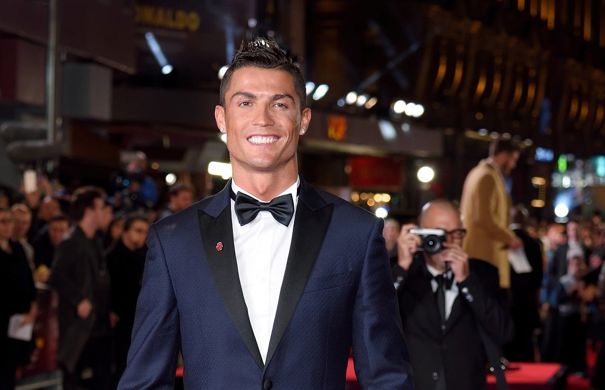 Cristiano Ronaldo smiling on red carpet at the world premiere of 'Ronaldo'