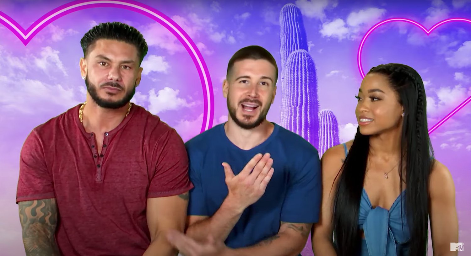 Pauly DelVecchio, Vinny Guadagnino, and Nikki Hall talk to the camera with a green screen image behind them for 'Double Shot at Love' Season 3