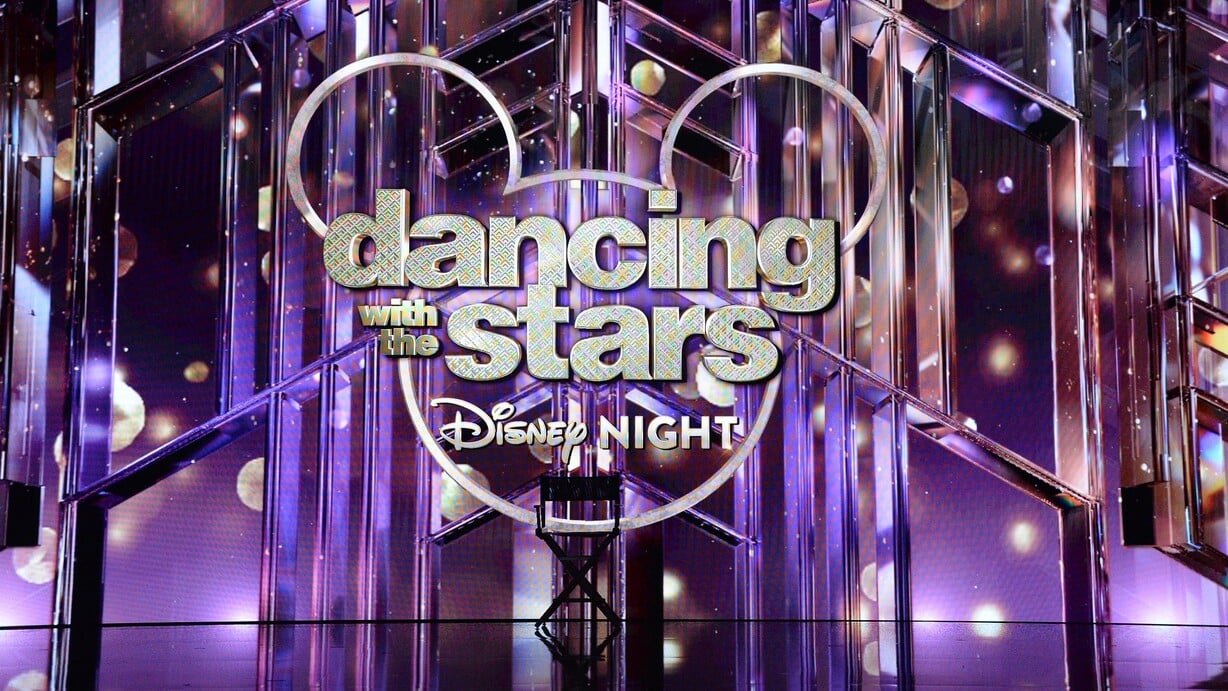 'DWTS' Disney Night logo projected onto the screen in the ballroom with a director's chair in view