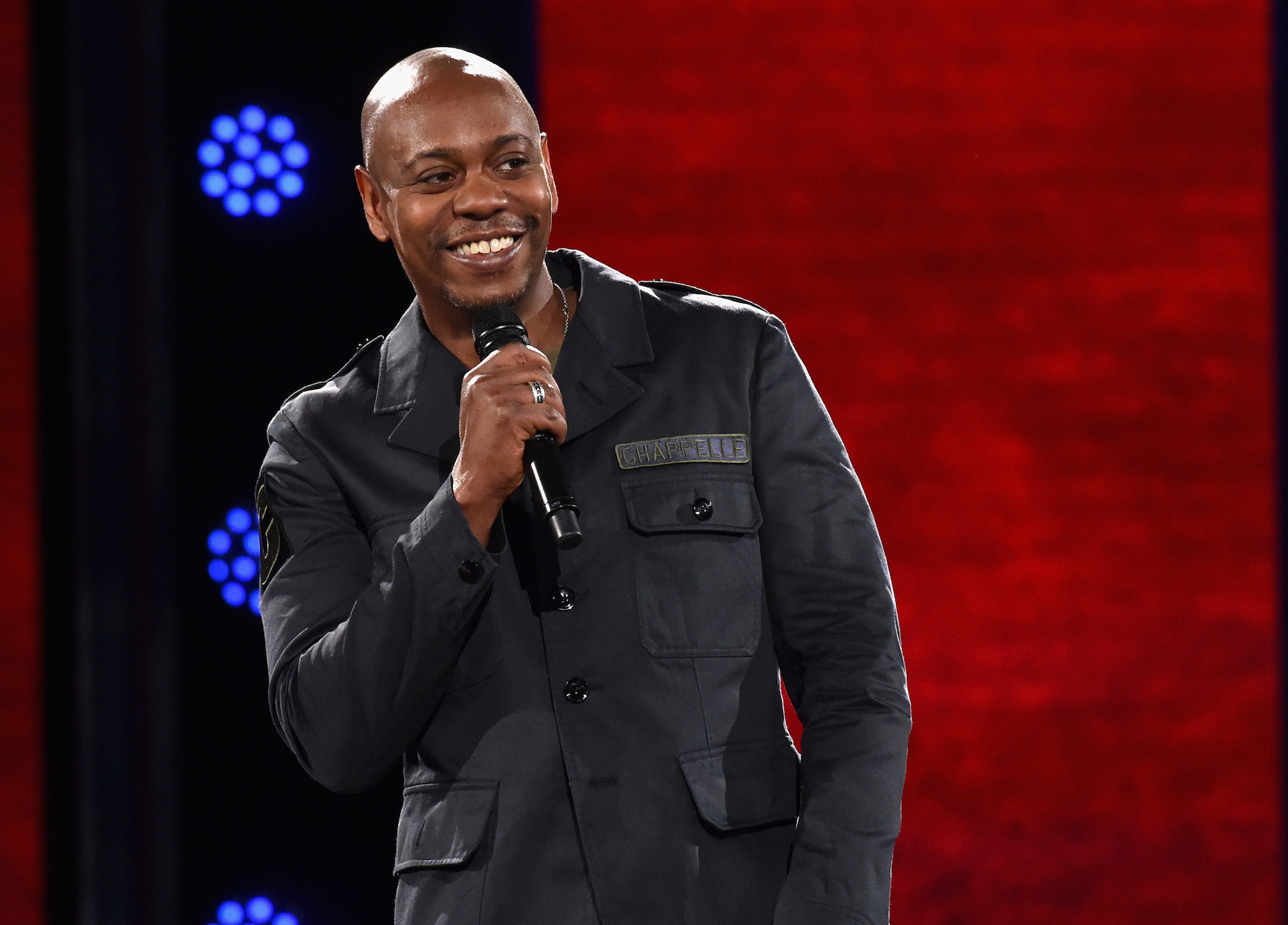 Dave Chappelle wearing a black outfit at The Hollywood Palladium