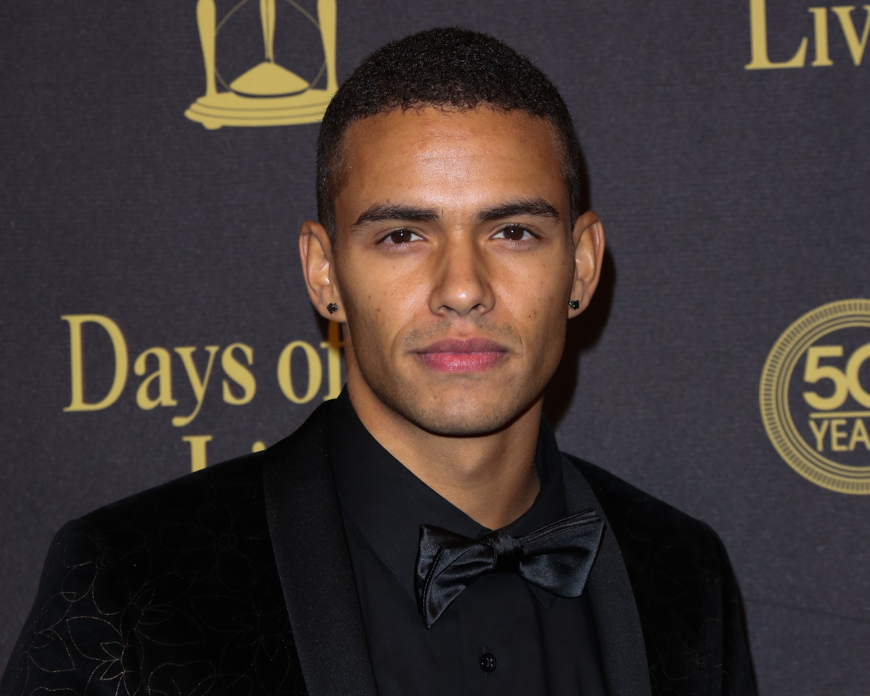 Days of Our Lives comings and goings focuses on Kyler Pettis, pictured here in a black tuxedo
