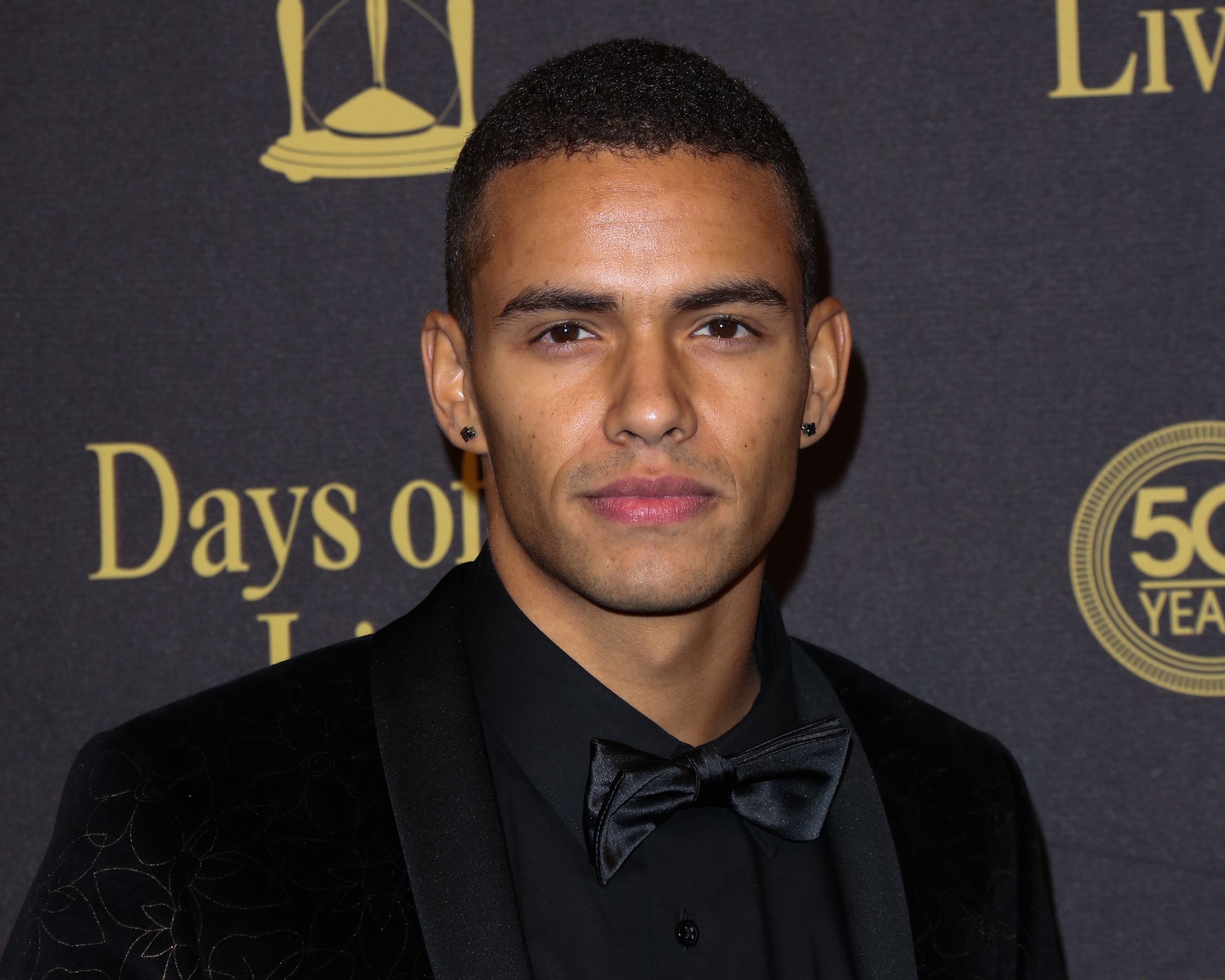 Days of Our Lives comings and goings focuses on Kyler Pettis, pictured here in a black tuxedo