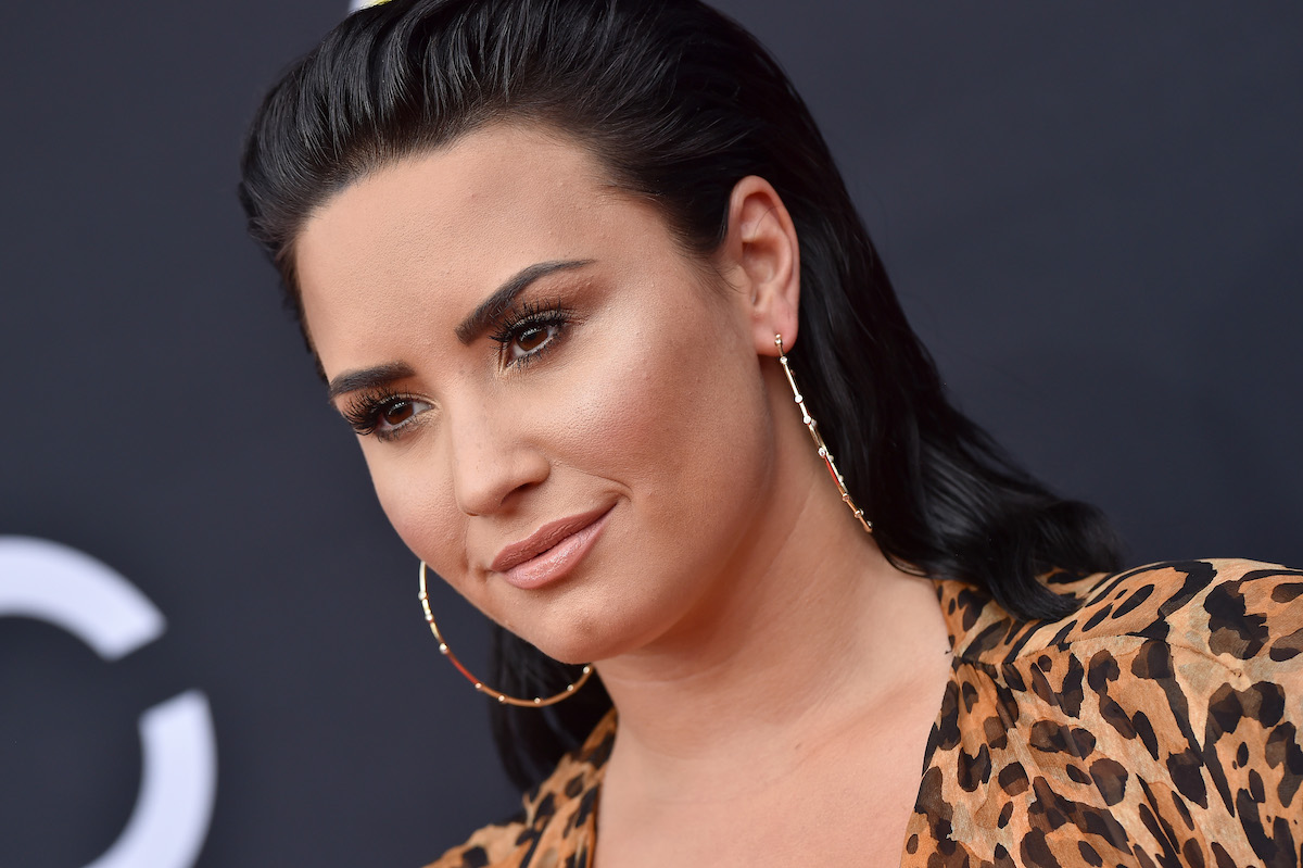 Demi Lovato wears leopard print at an event.