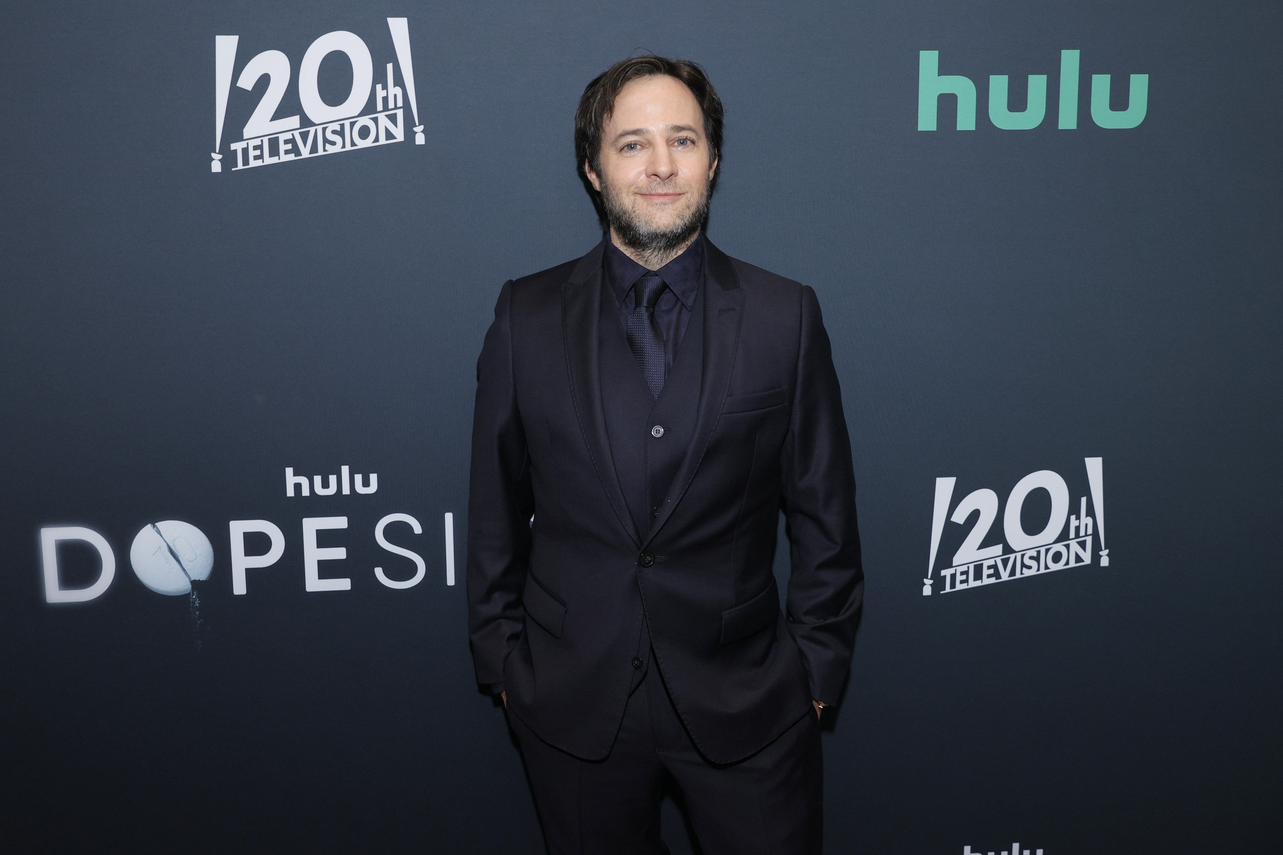 Danny Strong, creator and showrunner of 'Dopesick' on Hulu posing for photographers at the New York premiere