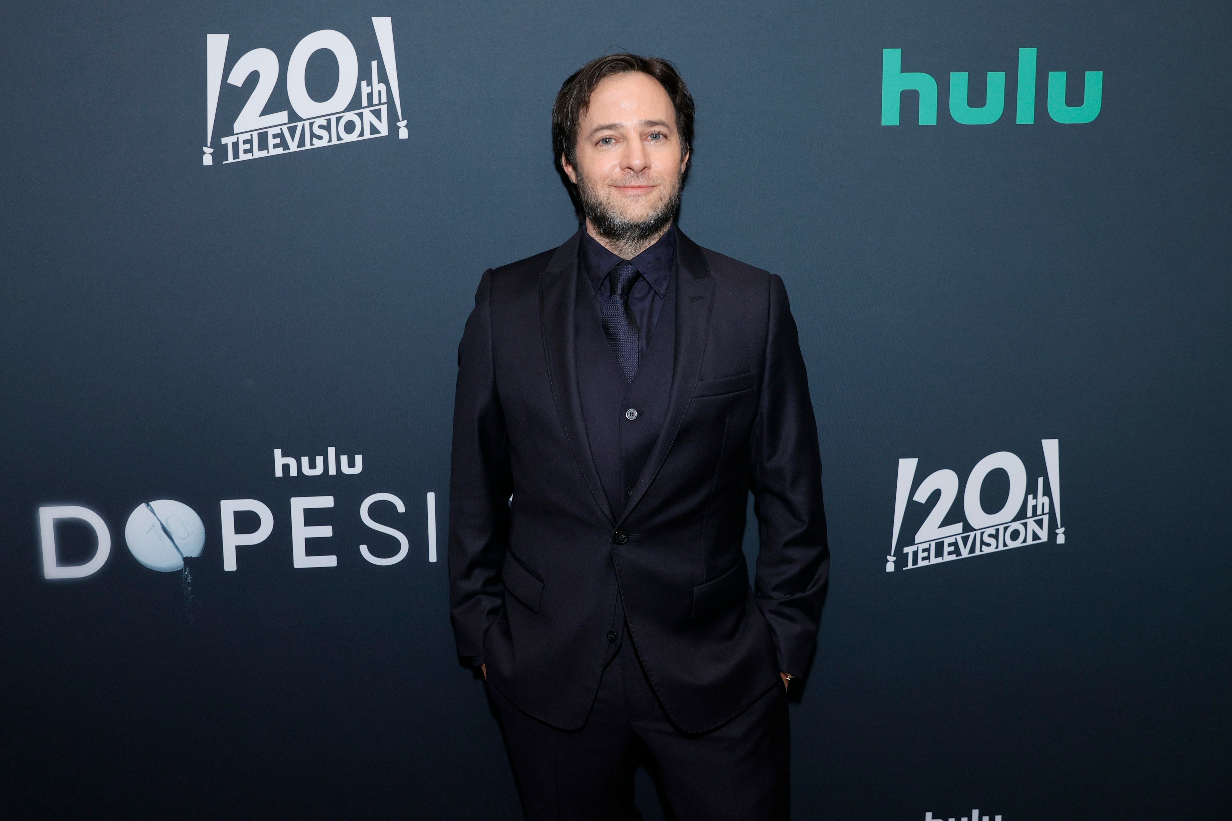 Danny Strong, creator and showrunner of 'Dopesick' on Hulu posing for photographers at the New York premiere