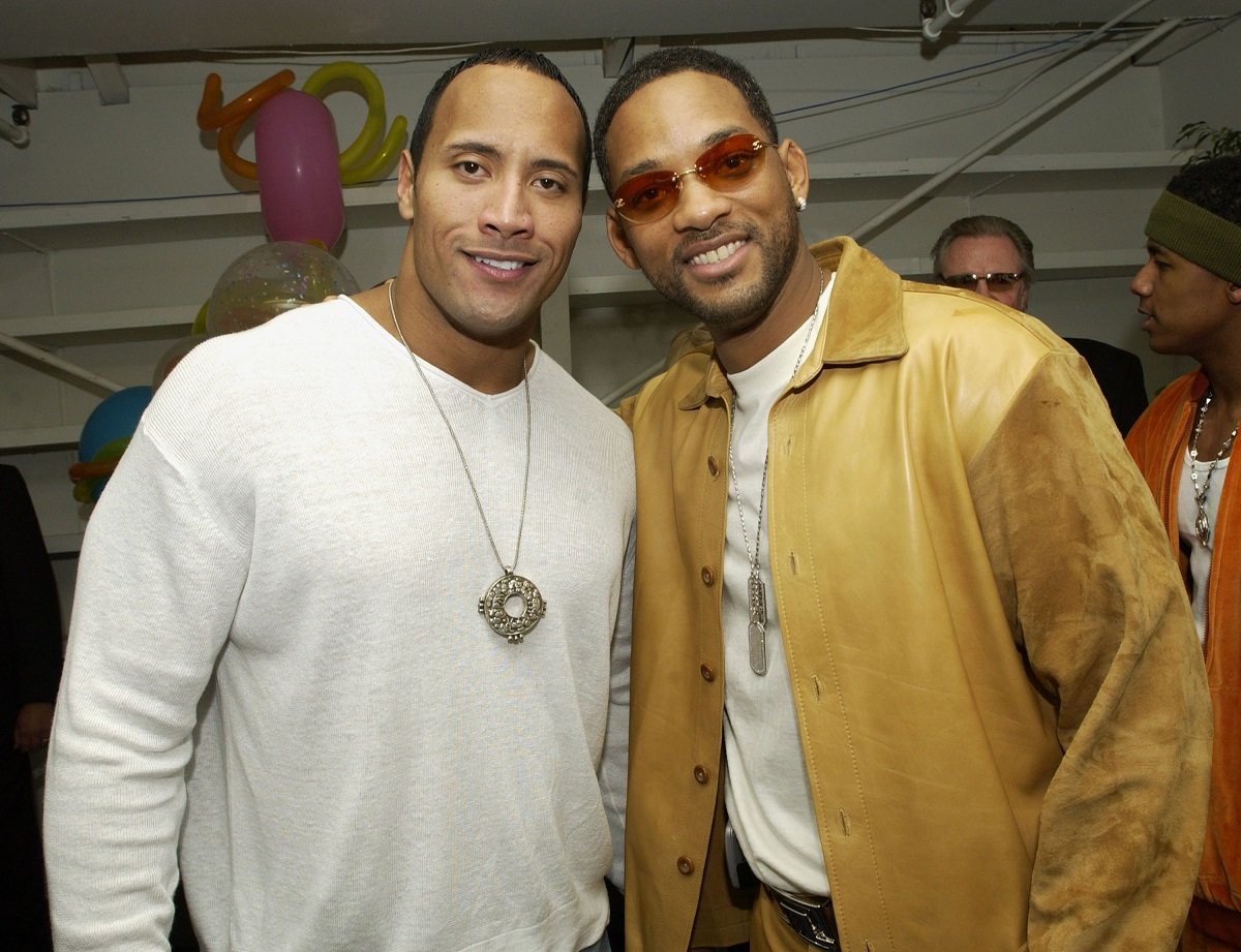 Dwayne Johnson and Will Smith smile