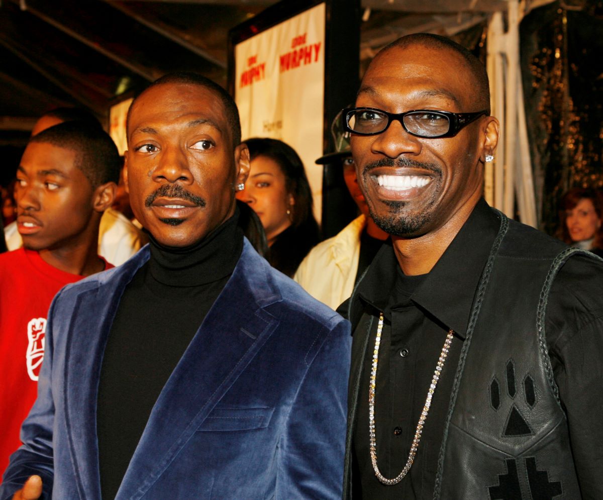 Eddie Murphy in blue velvet jacket with late brother, Charlie