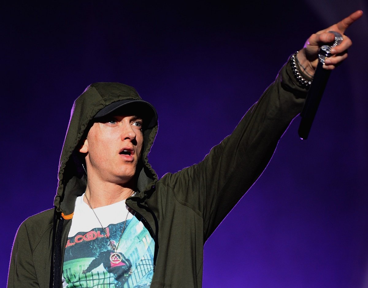 Eminem performing onstage during Lollapalooza