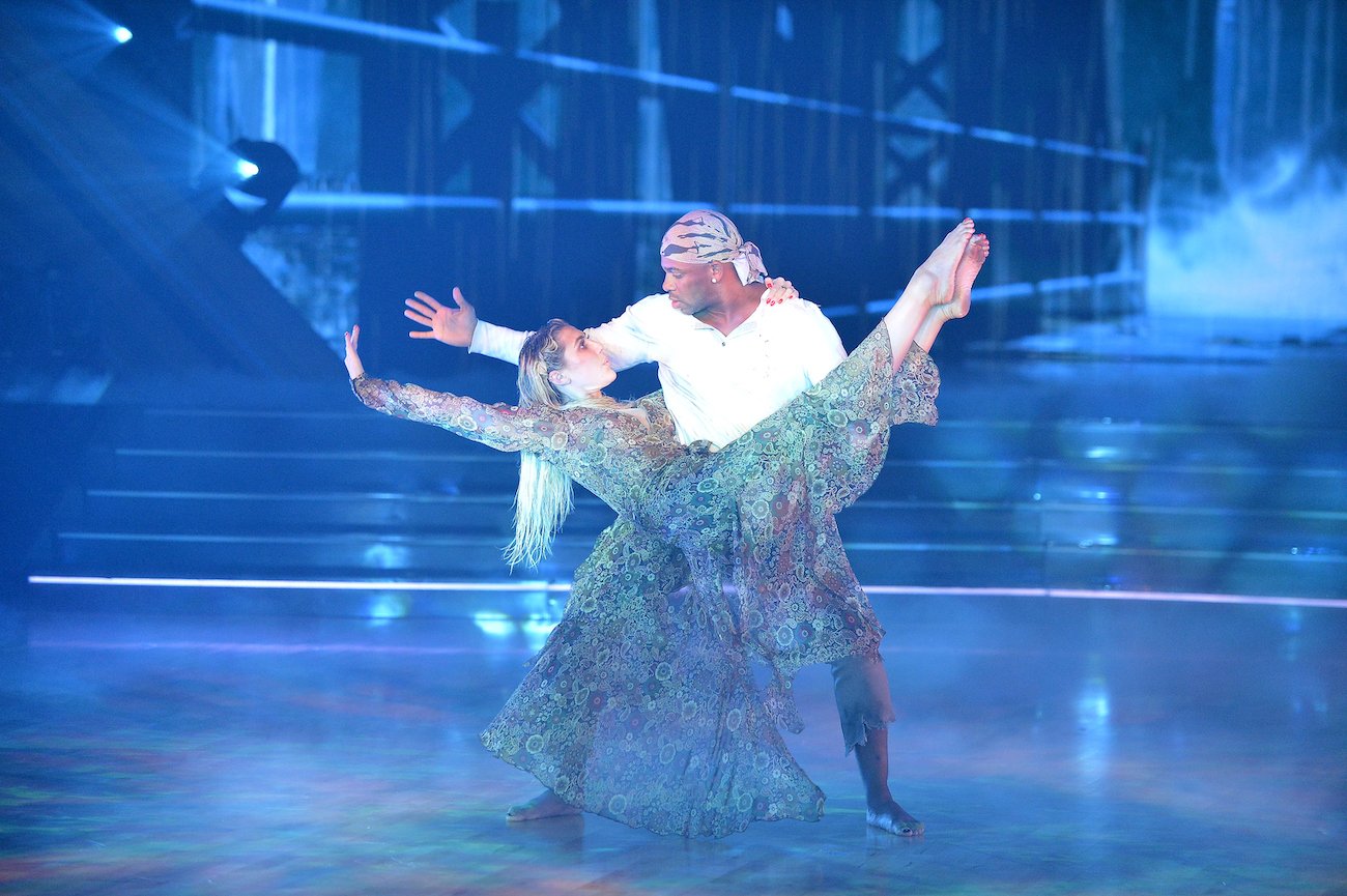 Jimmie Allen holds Emma Slater during their contemporary dance performance from the 'Dancing with the Stars' Season 30 Horror Night