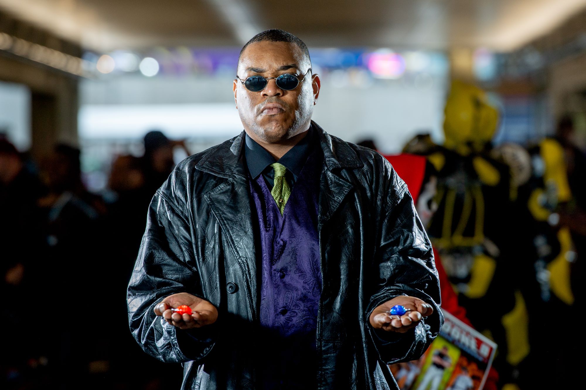 Fan dressed as Morpheus with sunglasses