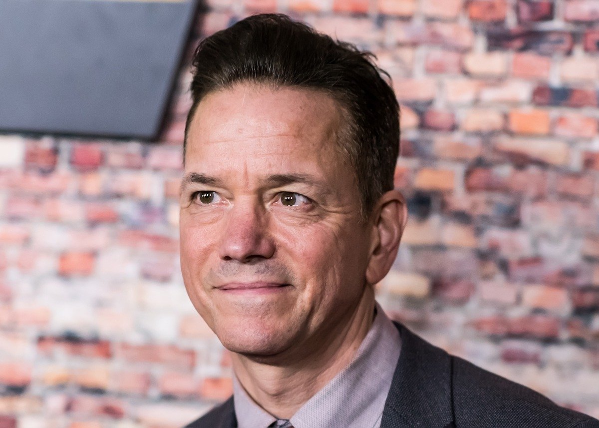 Actor Frank Whaley attends the 'Luke Cage' New York Premiere at AMC Magic Johnson Harlem wearing a lavender shirt and tie