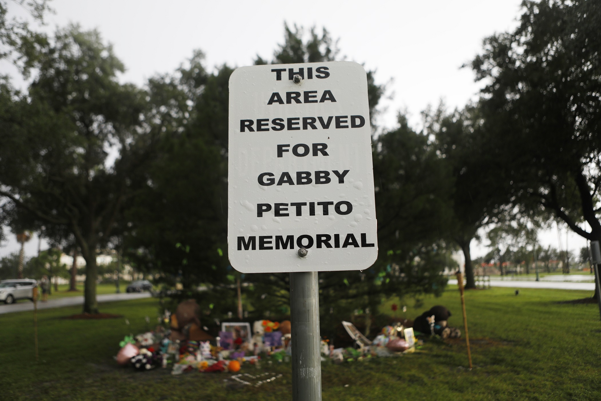 A memorial for Gabby Petito grows in North Port, Florida while authorities search for her boyfriend, Brian Laundrie