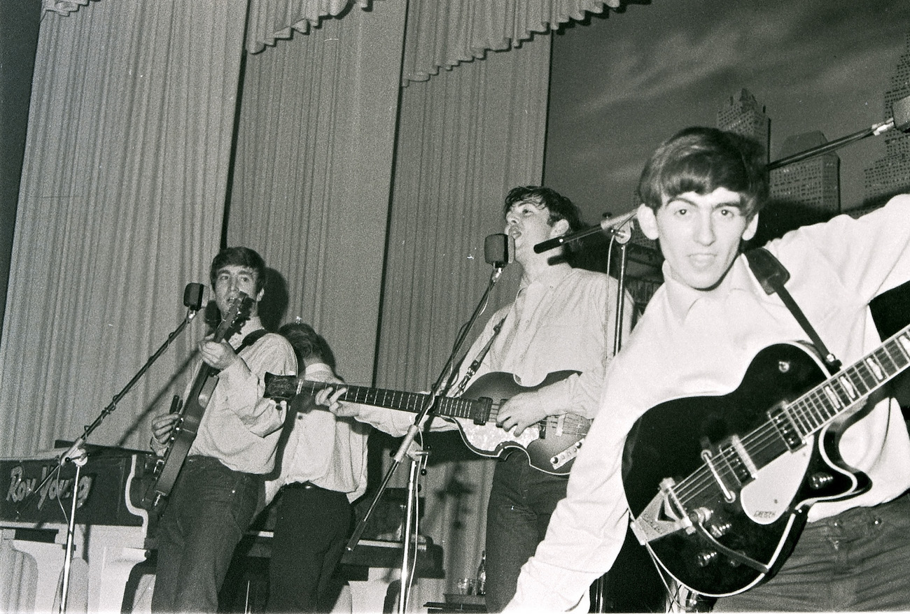 George Harrison and The Beatles performing in Hamburg, Germany, in 1962. 