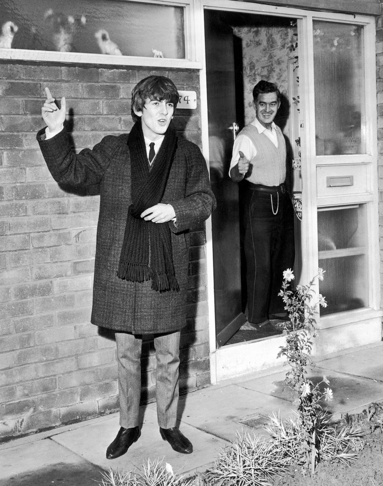 George Harrison and his father Harold Harrison saying goodbye to one another after a visit in 1963.