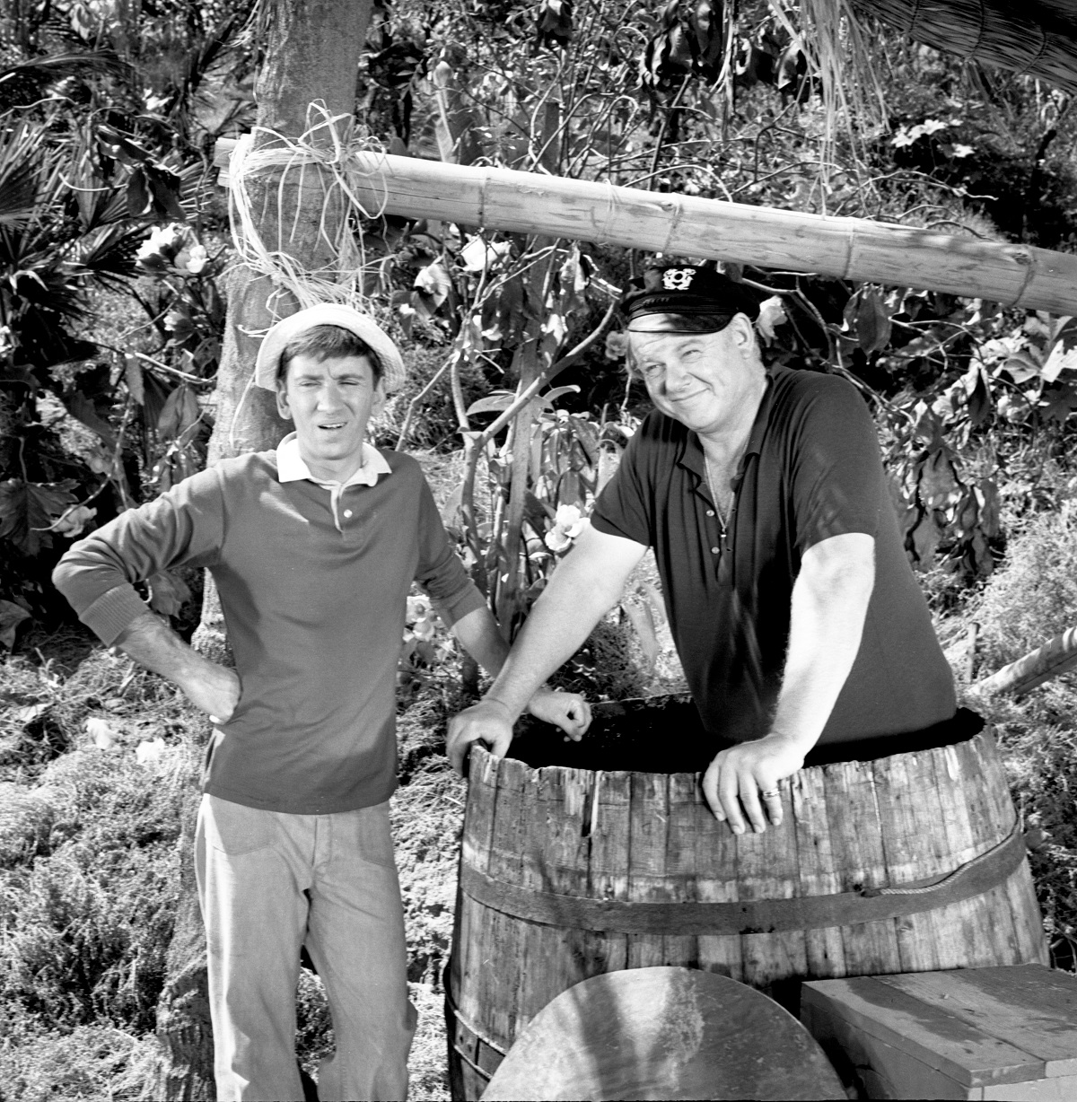 'Gilligan's Island' star Bob Denver poses next to Alan Hale Jr, who's stuck in a barrel.