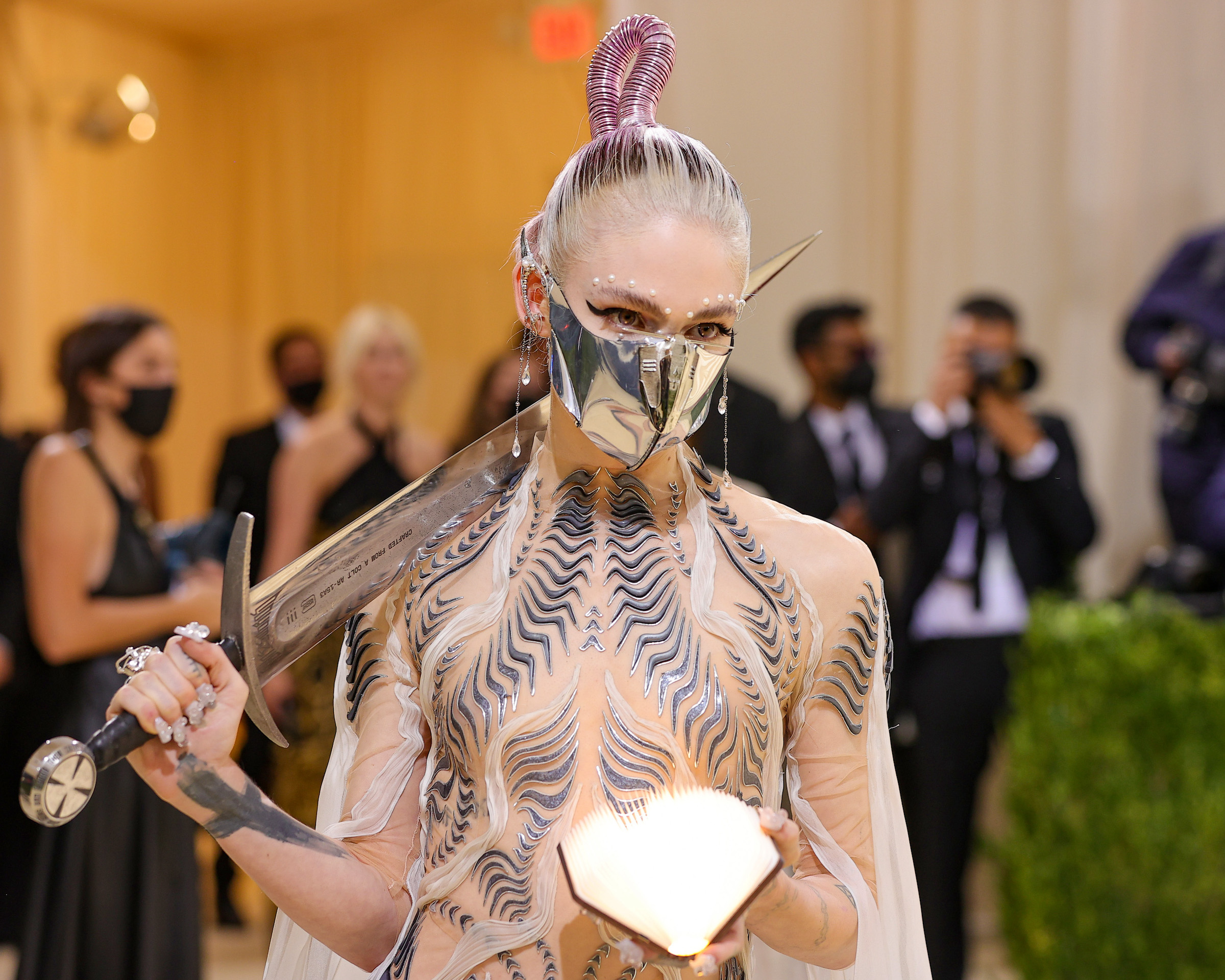 Grimes attends The 2021 Met Gala Celebrating In America: A Lexicon Of Fashion at Metropolitan Museum of Art on September 13, 2021 in New York City.