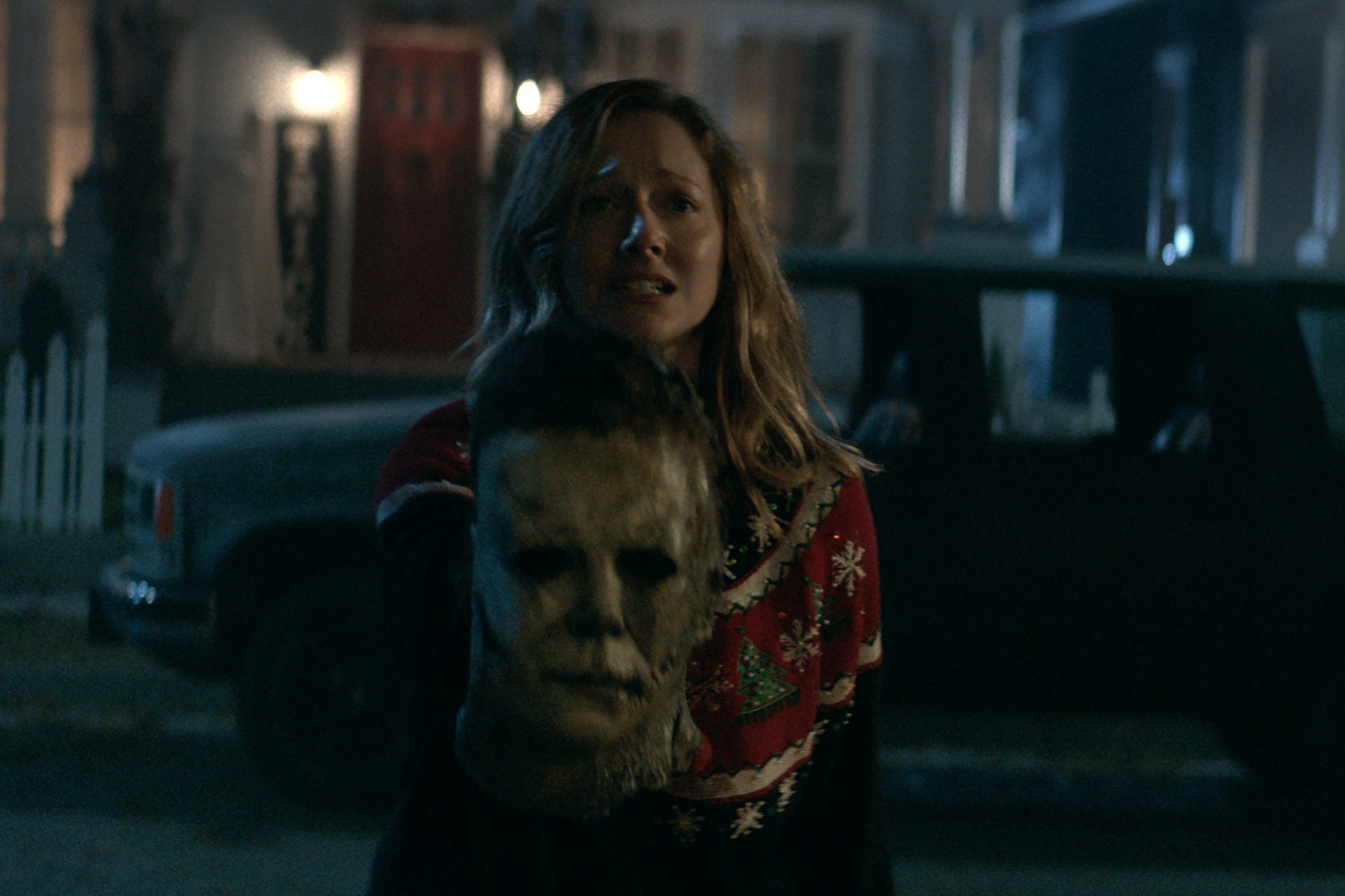 'Halloween Kills' actor Judy Greer as Karen holding Michael Myers' mask