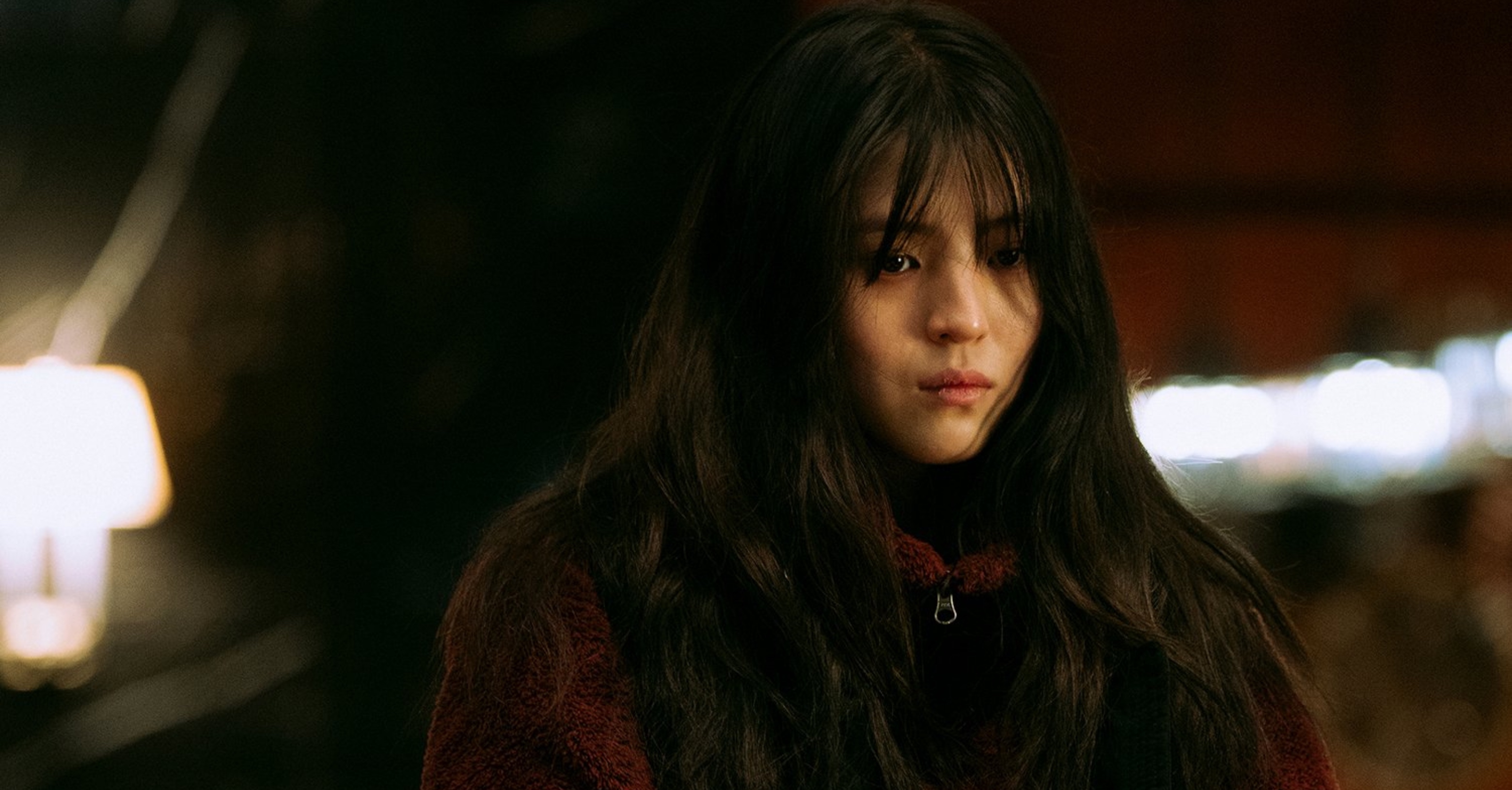 Han So-hee as Yoon Ji-woo for 'My Name' Netflix K-drama wearing maroon sherpa jacket.
