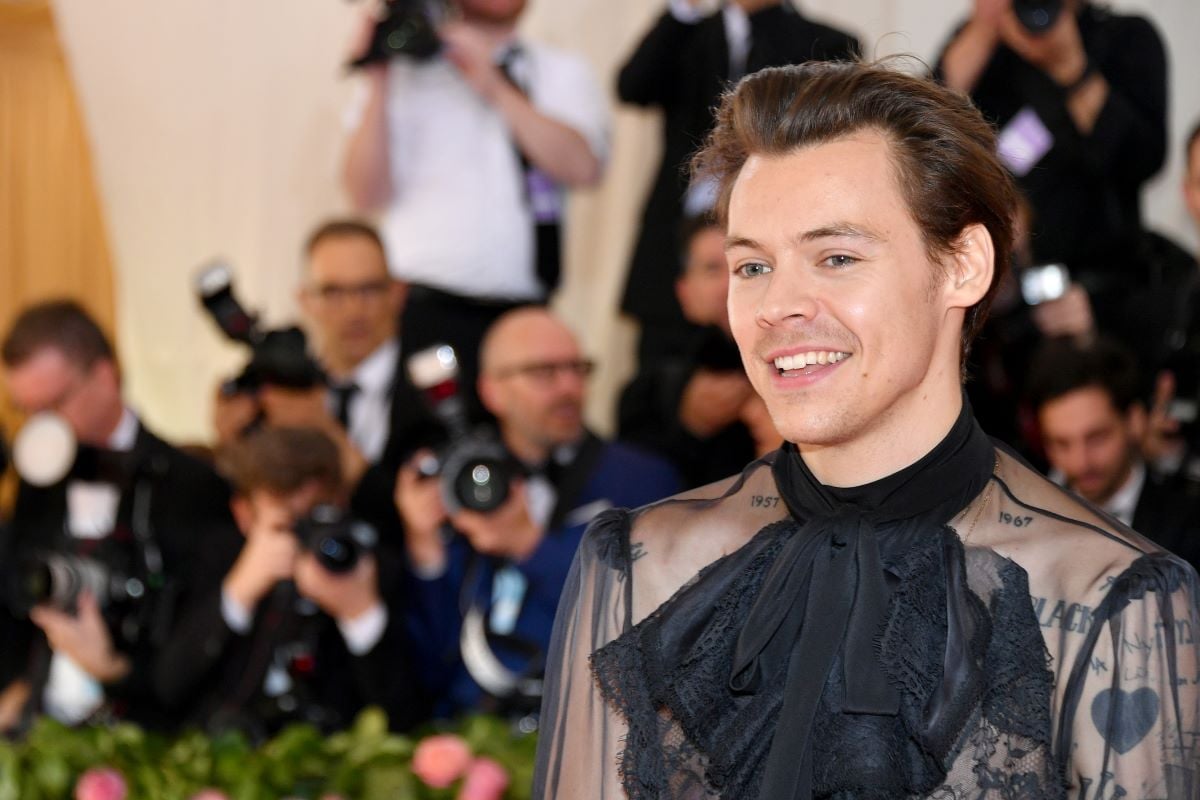 Harry Styles wearing a black sheer top at the Met Gala